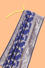 Blue floral design art silk saree with self zari border and matching motifs blouse