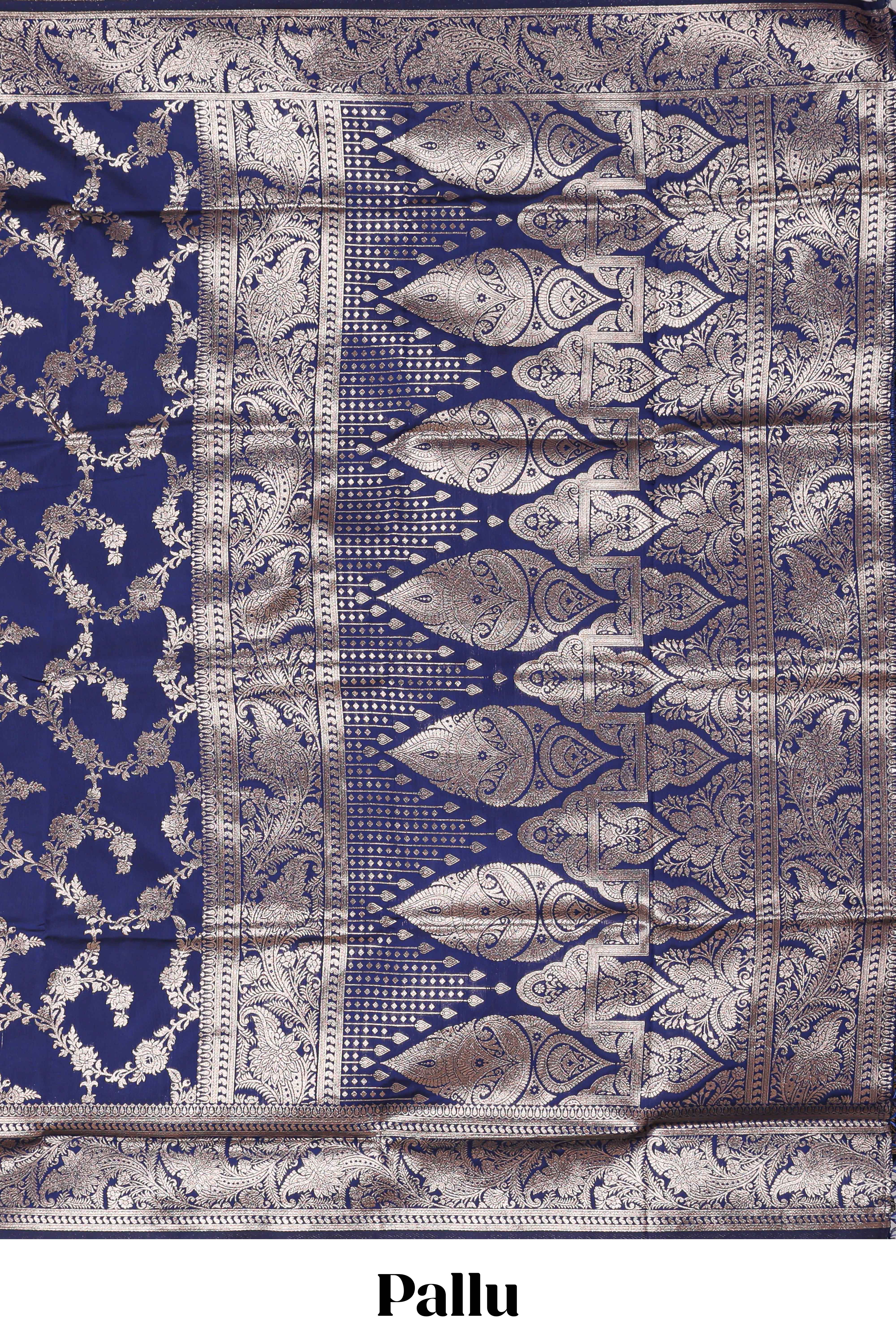 Blue floral design art silk saree with self zari border and matching motifs blouse