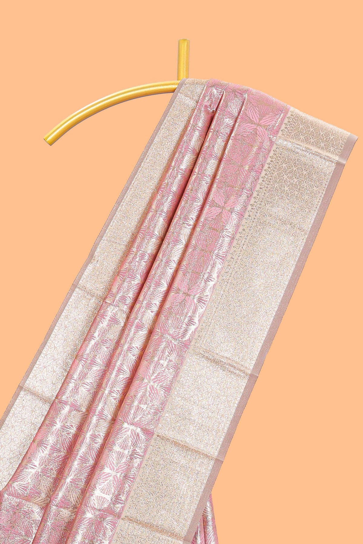 Pink geometric floral design art silk saree with contrast zari border and motifs blouse