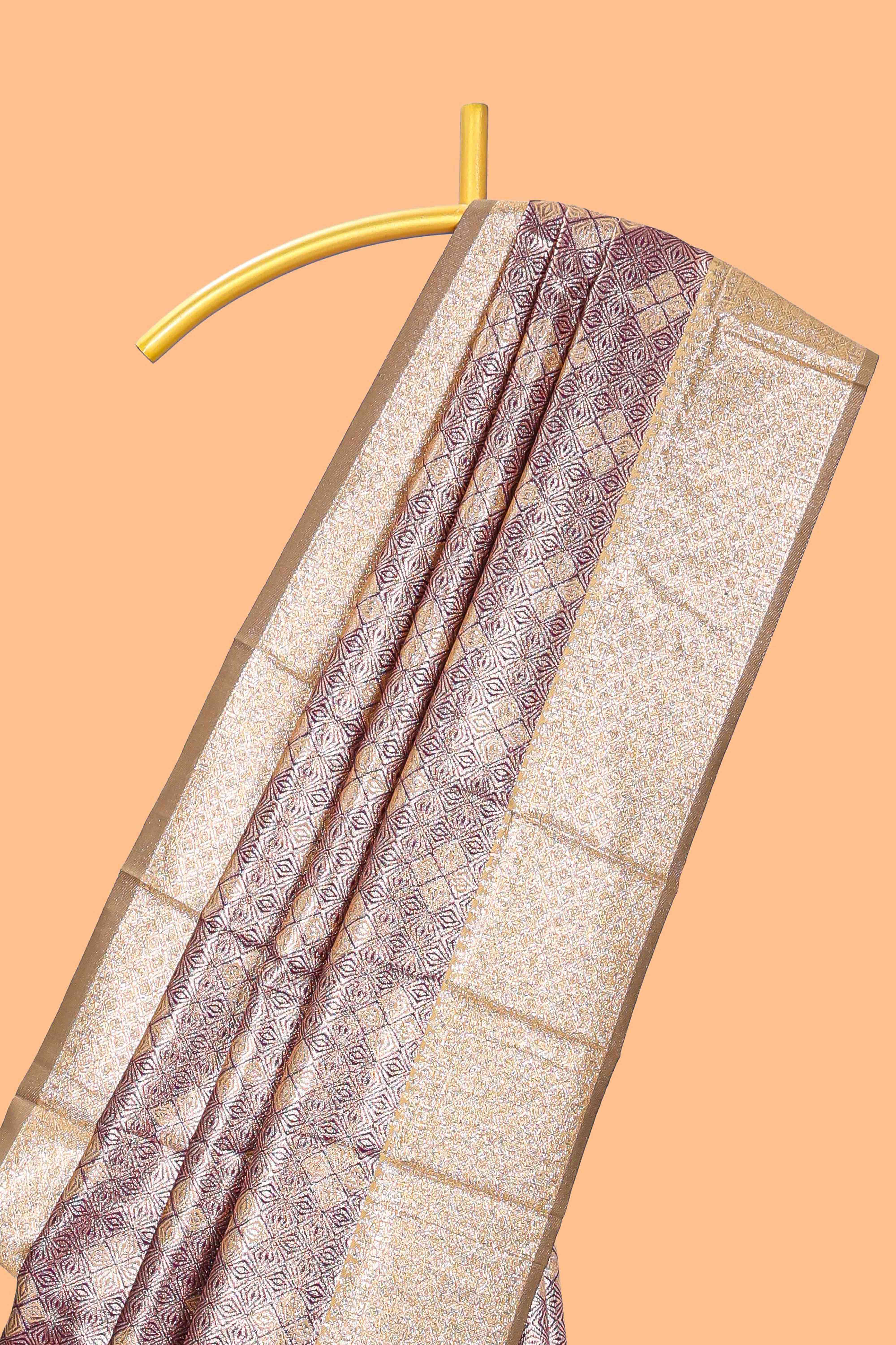 Purple floral design art silk saree with contrast zari border and motifs blouse