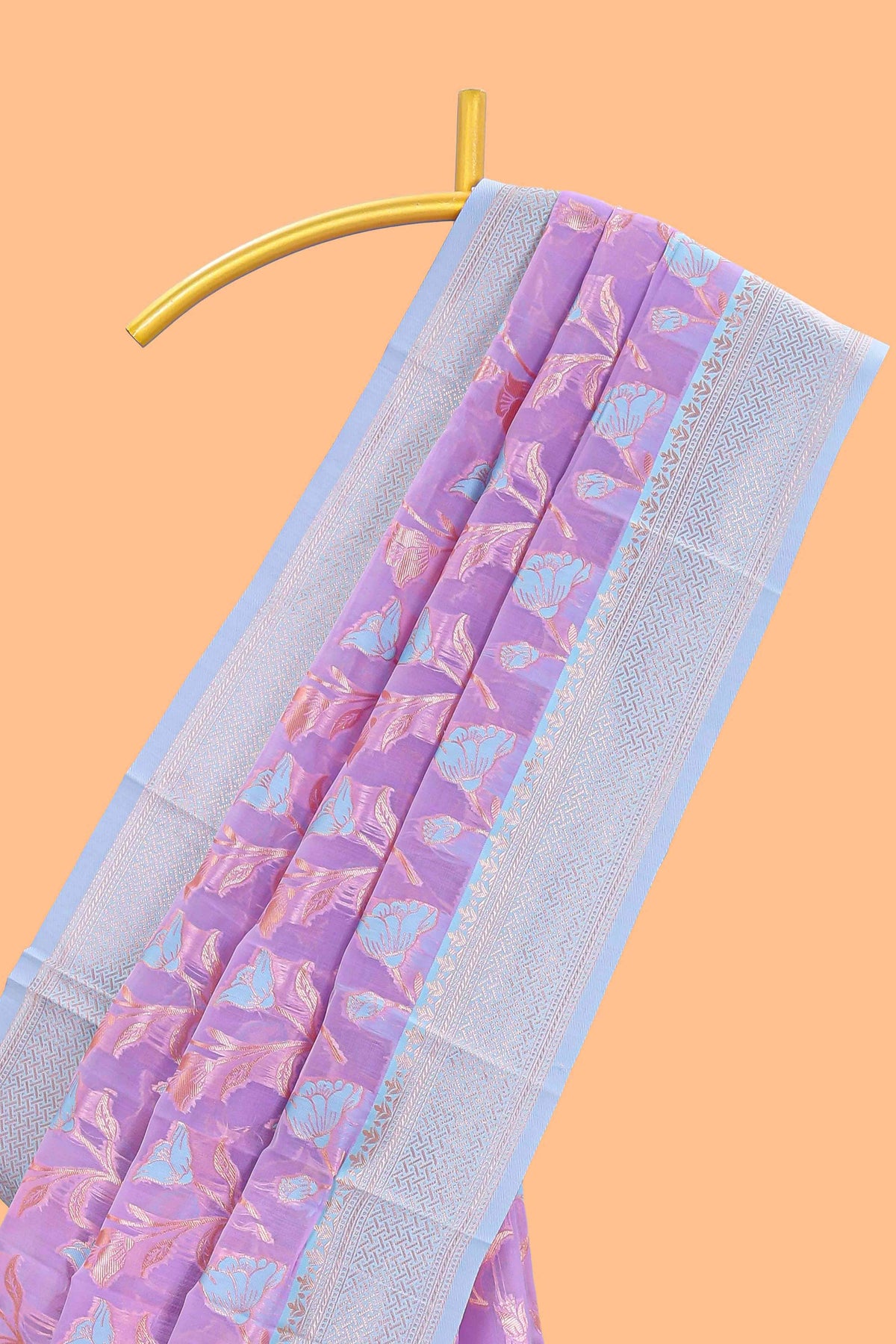 Lavender floral design art silk saree with contrast zari border and motifs blouse