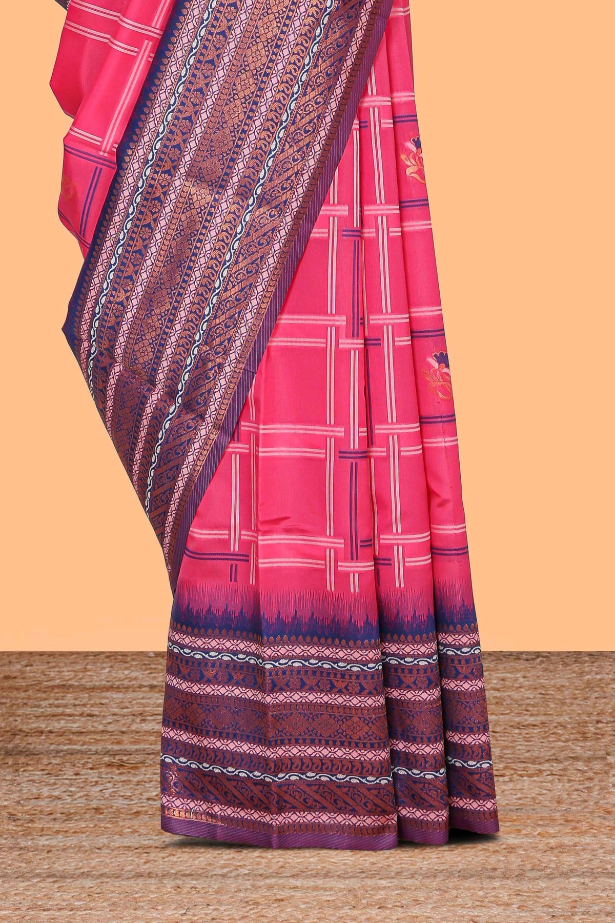 Pink checked floral motifs design art silk saree with contrast border and motifs blouse