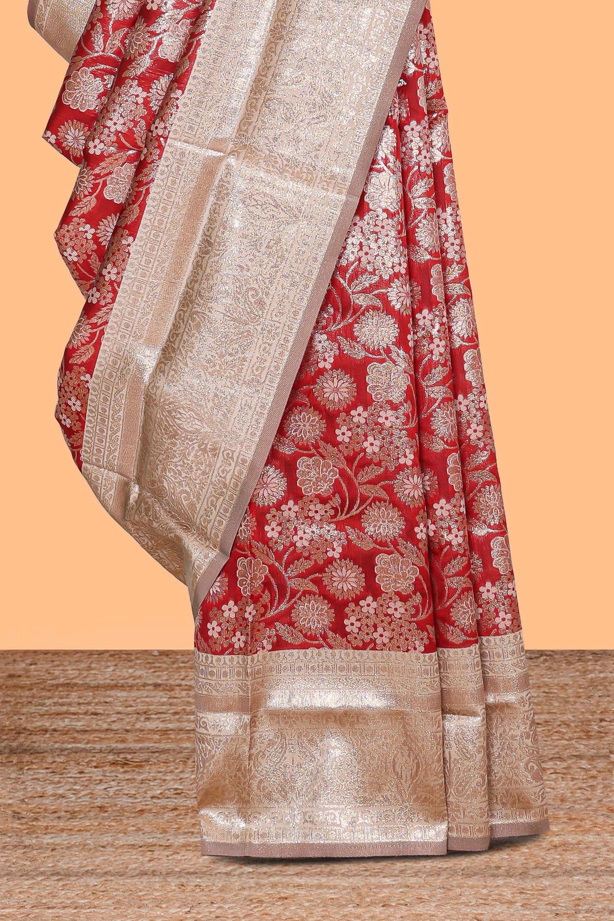 Red floral design art silk saree with contrast zari border and motifs blouse
