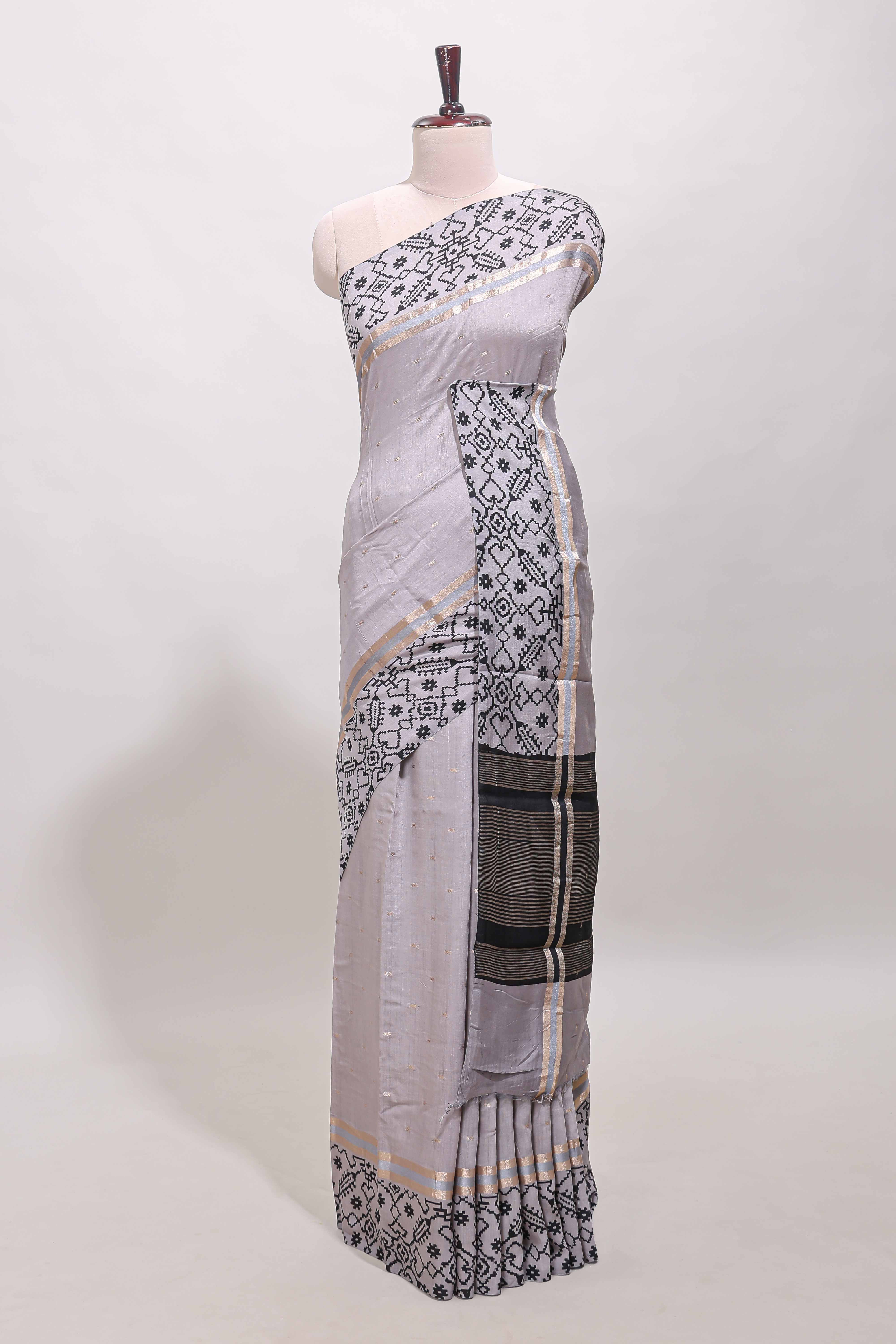 Faded lavender plain assam silk saree eith self ikkat style border and matching blouse