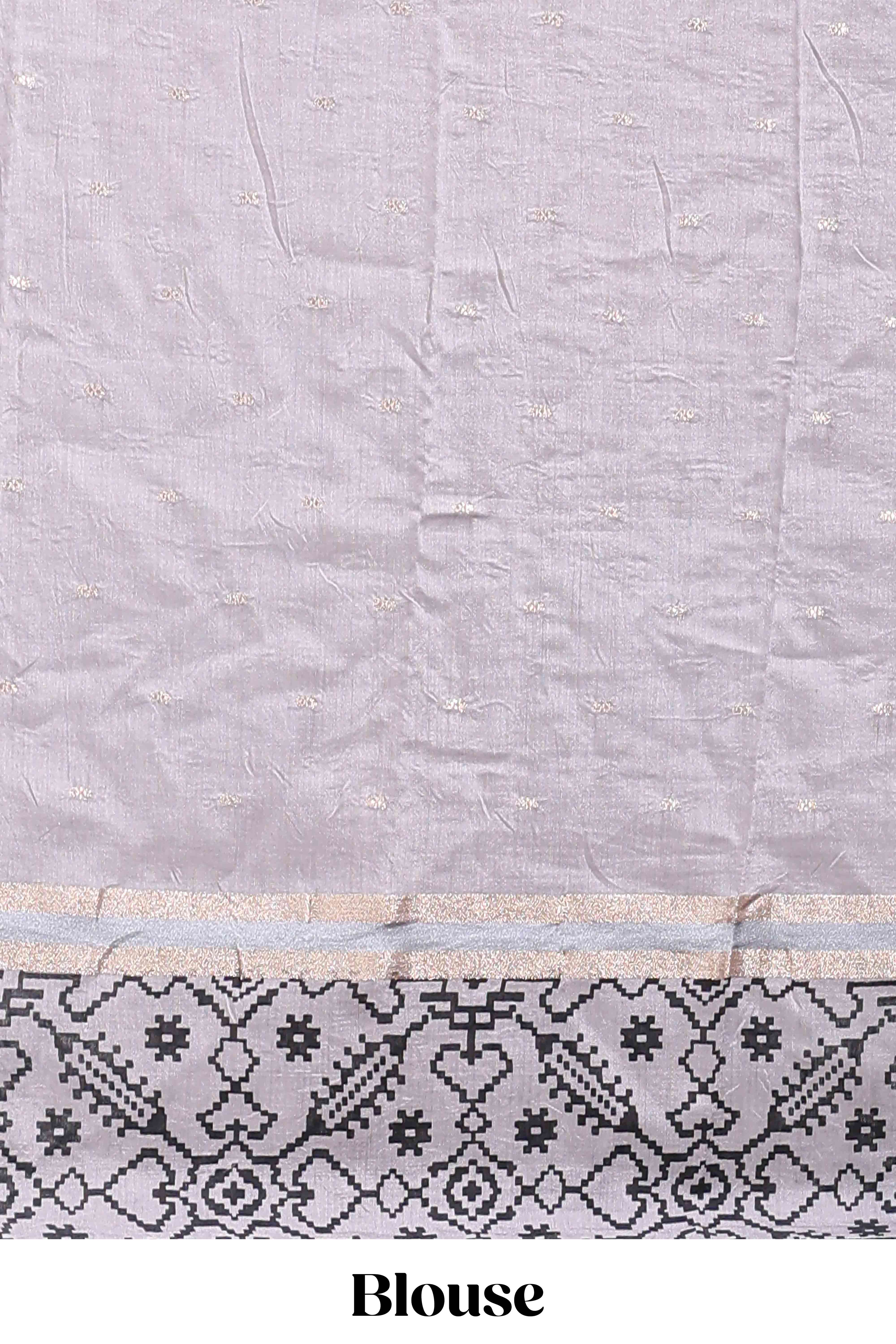 Faded lavender plain assam silk saree eith self ikkat style border and matching blouse