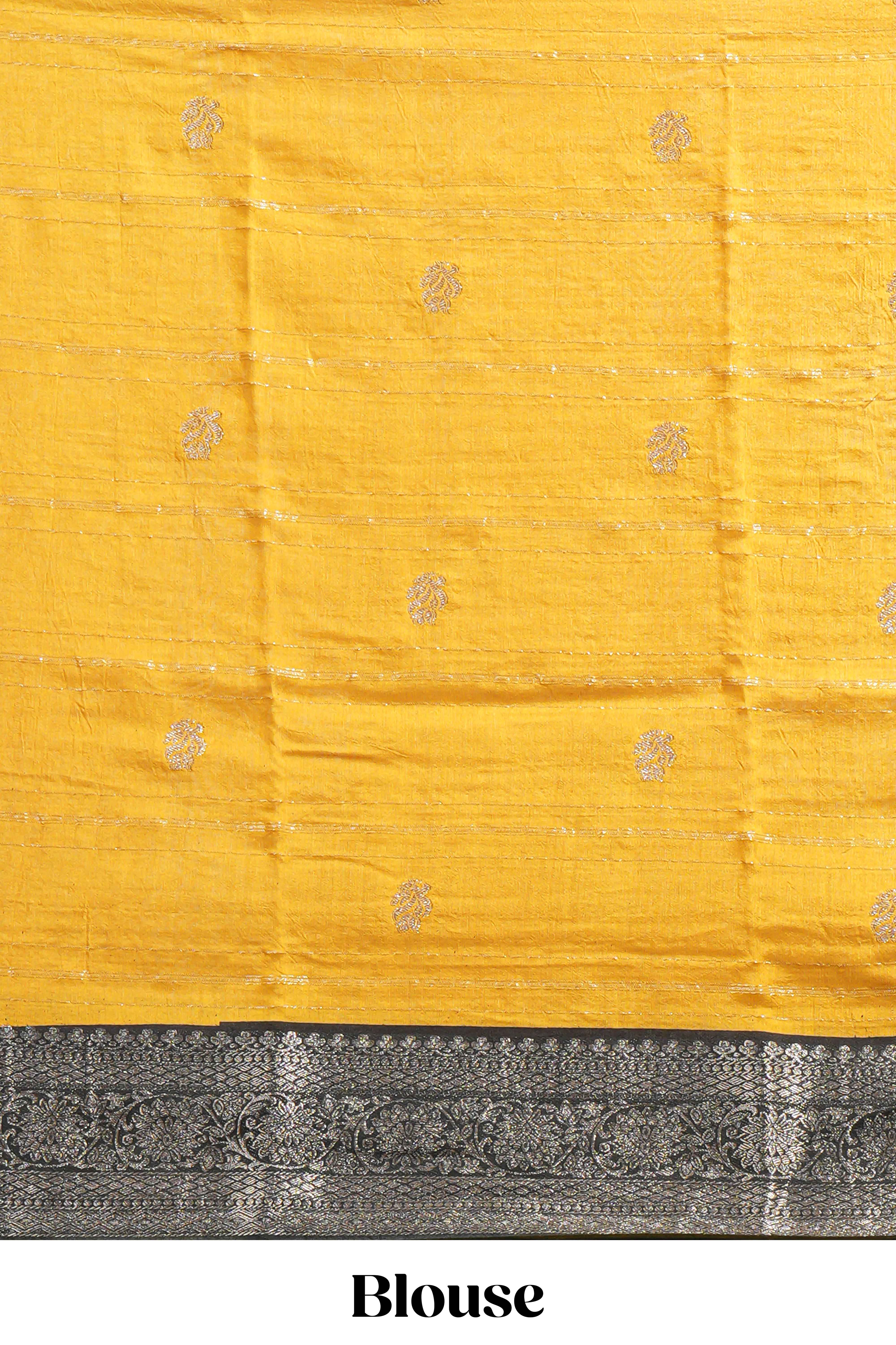 Mustard yellow Assam Silk saree floral and paisley motifs with a rich grey zari border and contrast pallu along with matching blouse