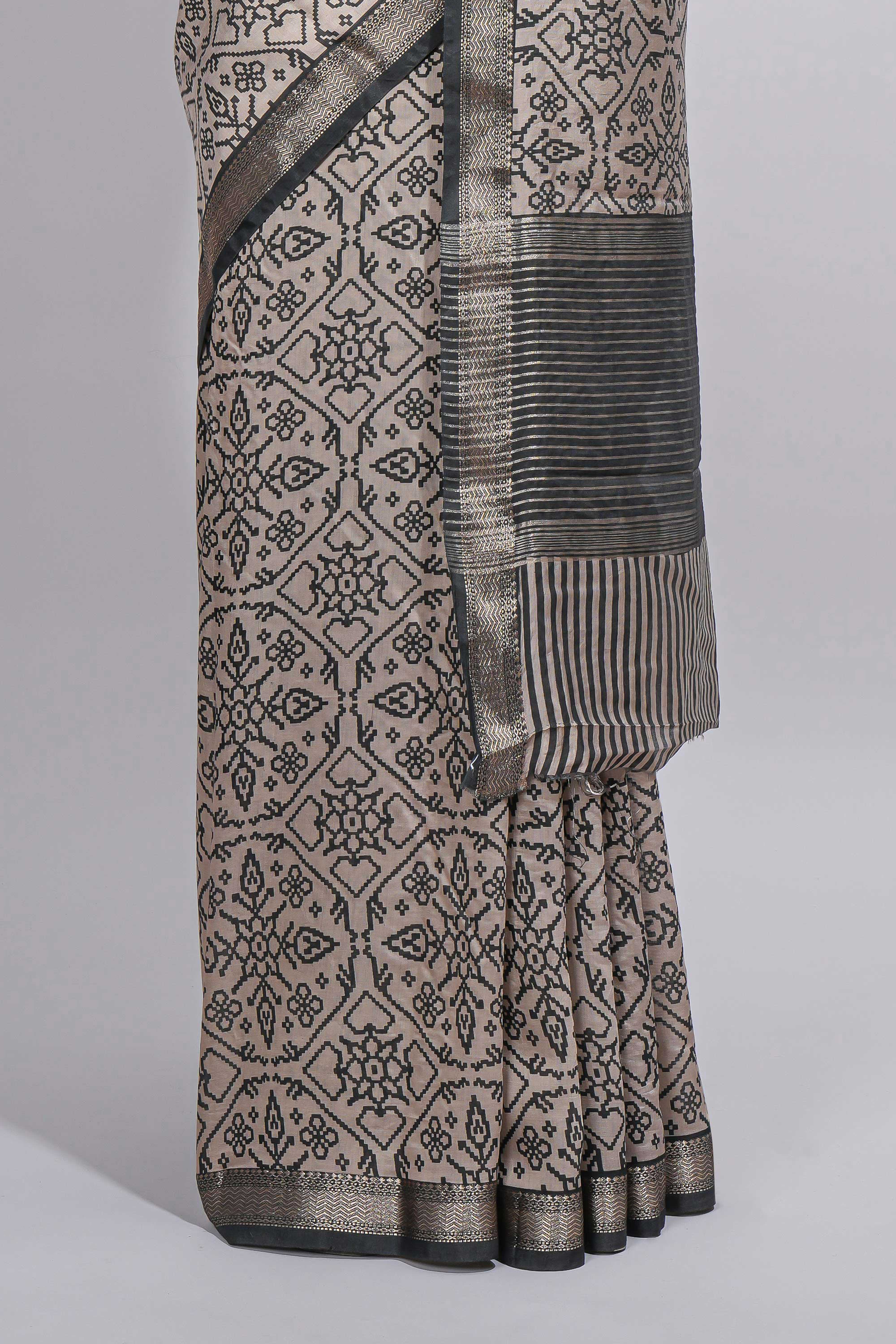 Ivory colour Assam Silk saree traditional folk motif print floral patterns and a contrast woven border The detailed pallu along with contrast blouse