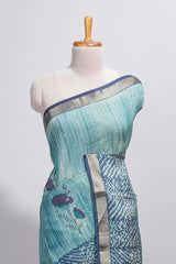 Aqua blue Assam Silk saree with woven patterns floral details contrast navy pallu and zari border along with printed blouse