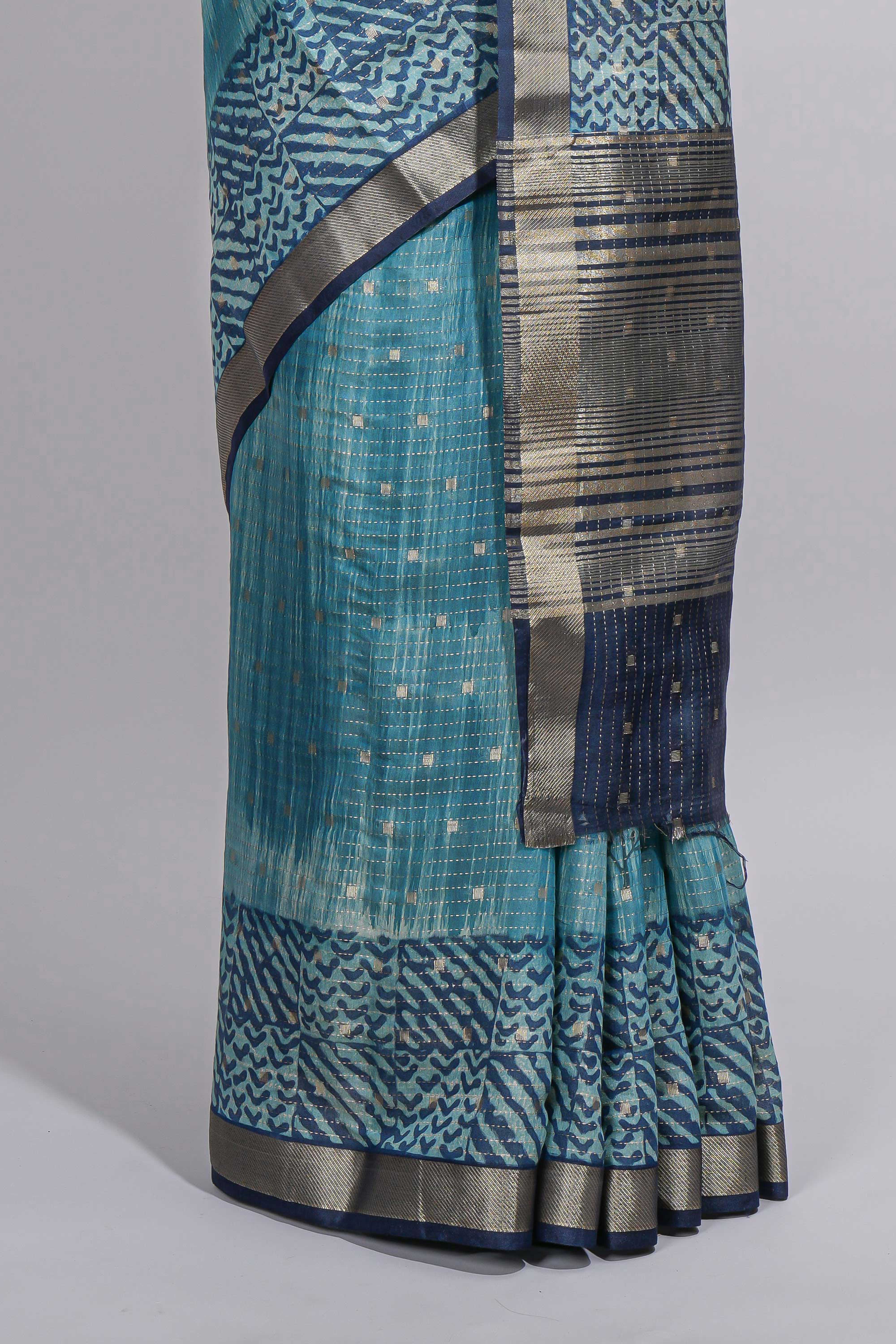 Aqua blue Assam Silk saree with woven patterns floral details contrast navy pallu and zari border along with printed blouse
