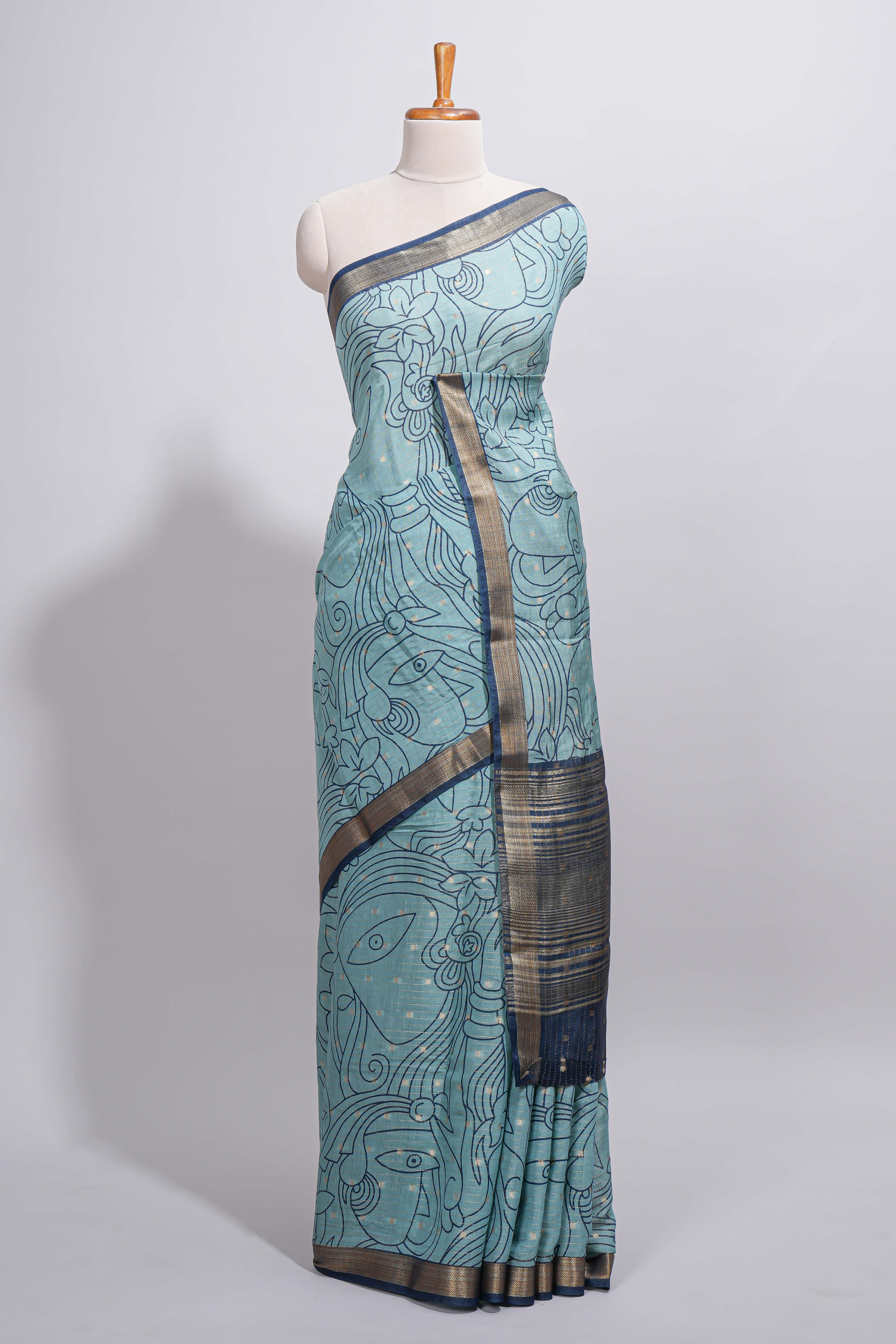 Elegant aqua blue Assam Silk saree abstract floral line motifs subtle woven details contrast pallu and rich zari border and contrast blouse