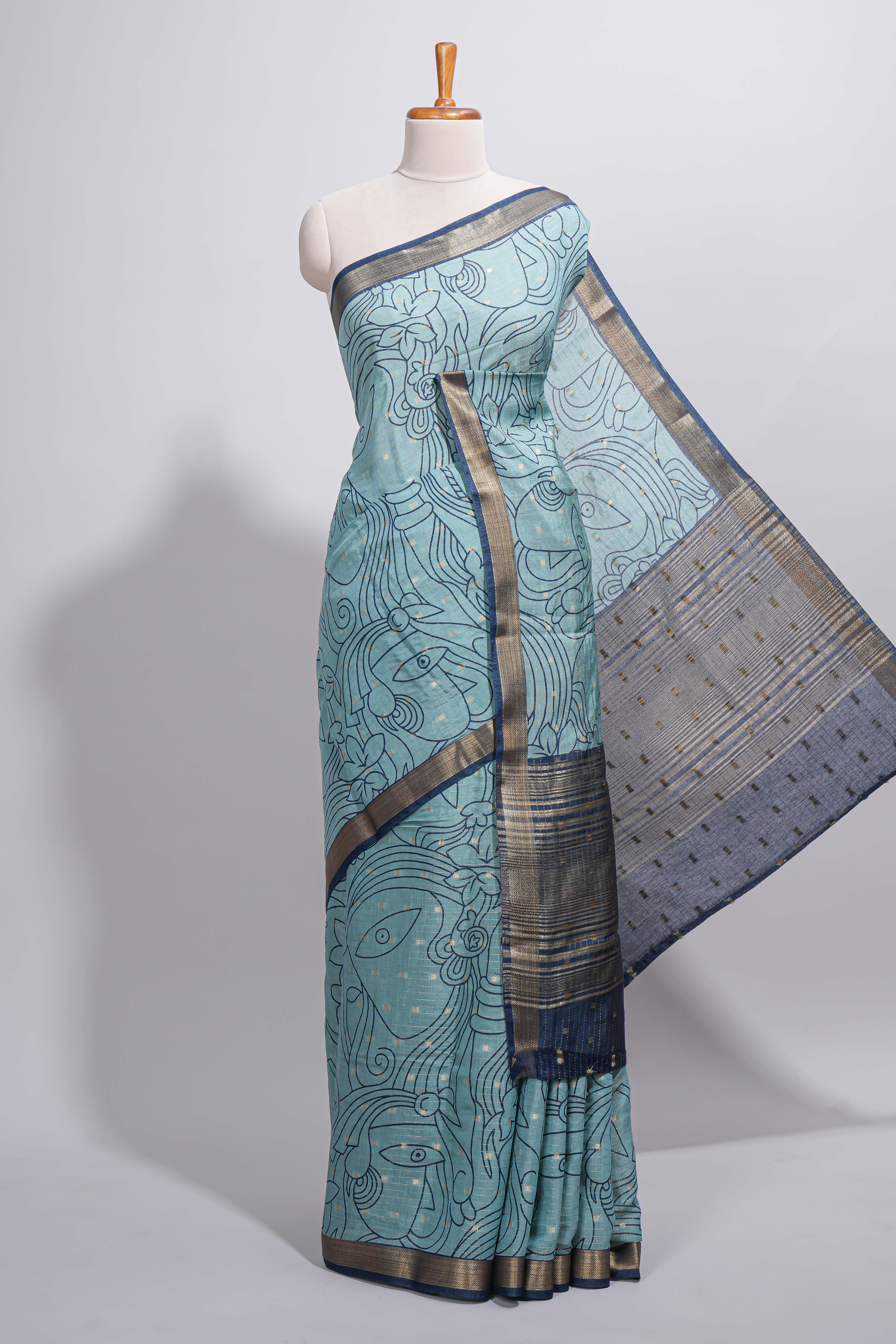 Elegant aqua blue Assam Silk saree abstract floral line motifs subtle woven details contrast pallu and rich zari border and contrast blouse