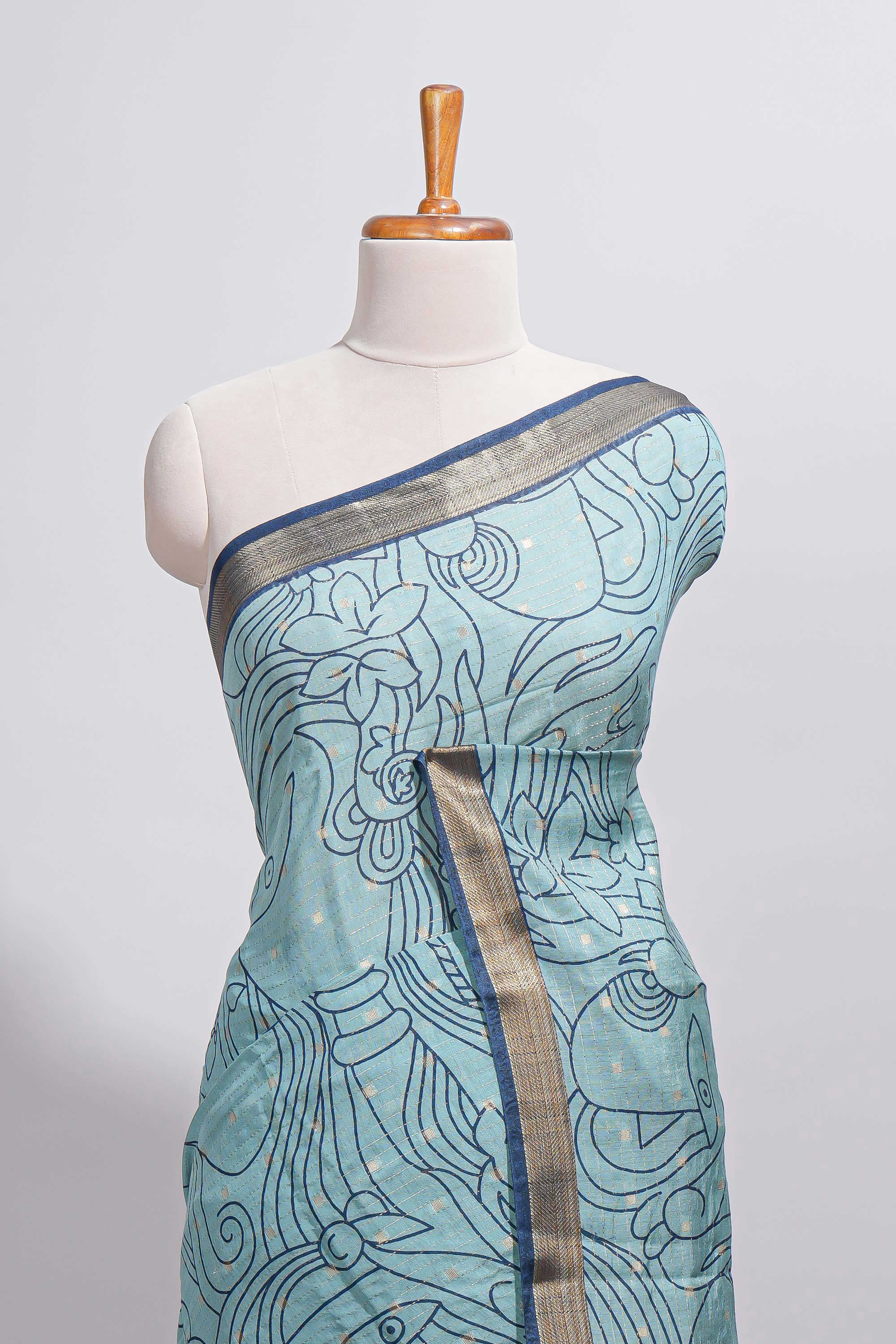 Aqua blue Assam Silk saree with woven patterns floral details contrast navy pallu and zari border along with printed blouse (Copy)