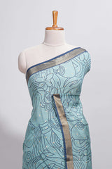 Elegant aqua blue Assam Silk saree abstract floral line motifs subtle woven details contrast pallu and rich zari border and contrast blouse