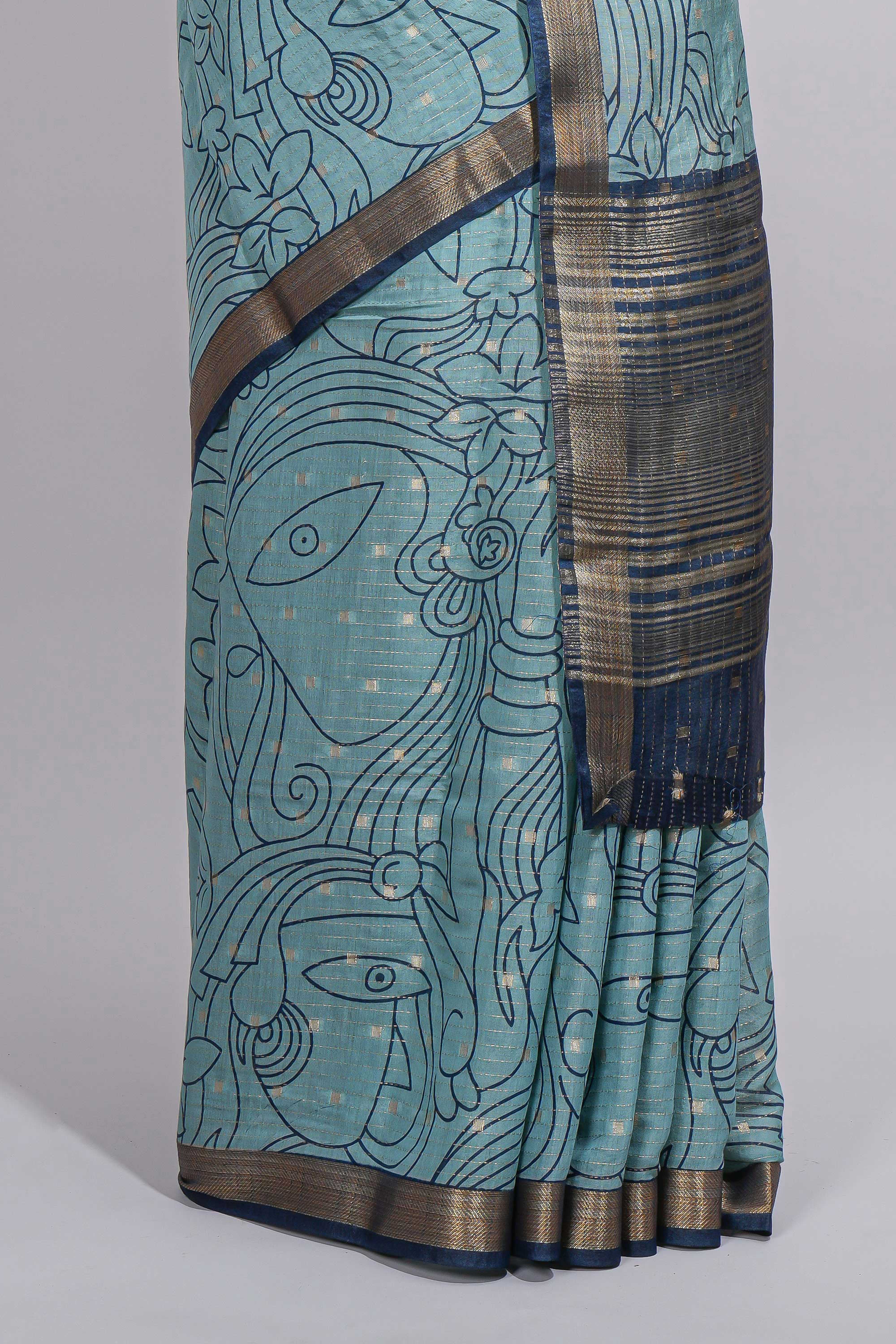 Elegant aqua blue Assam Silk saree abstract floral line motifs subtle woven details contrast pallu and rich zari border and contrast blouse