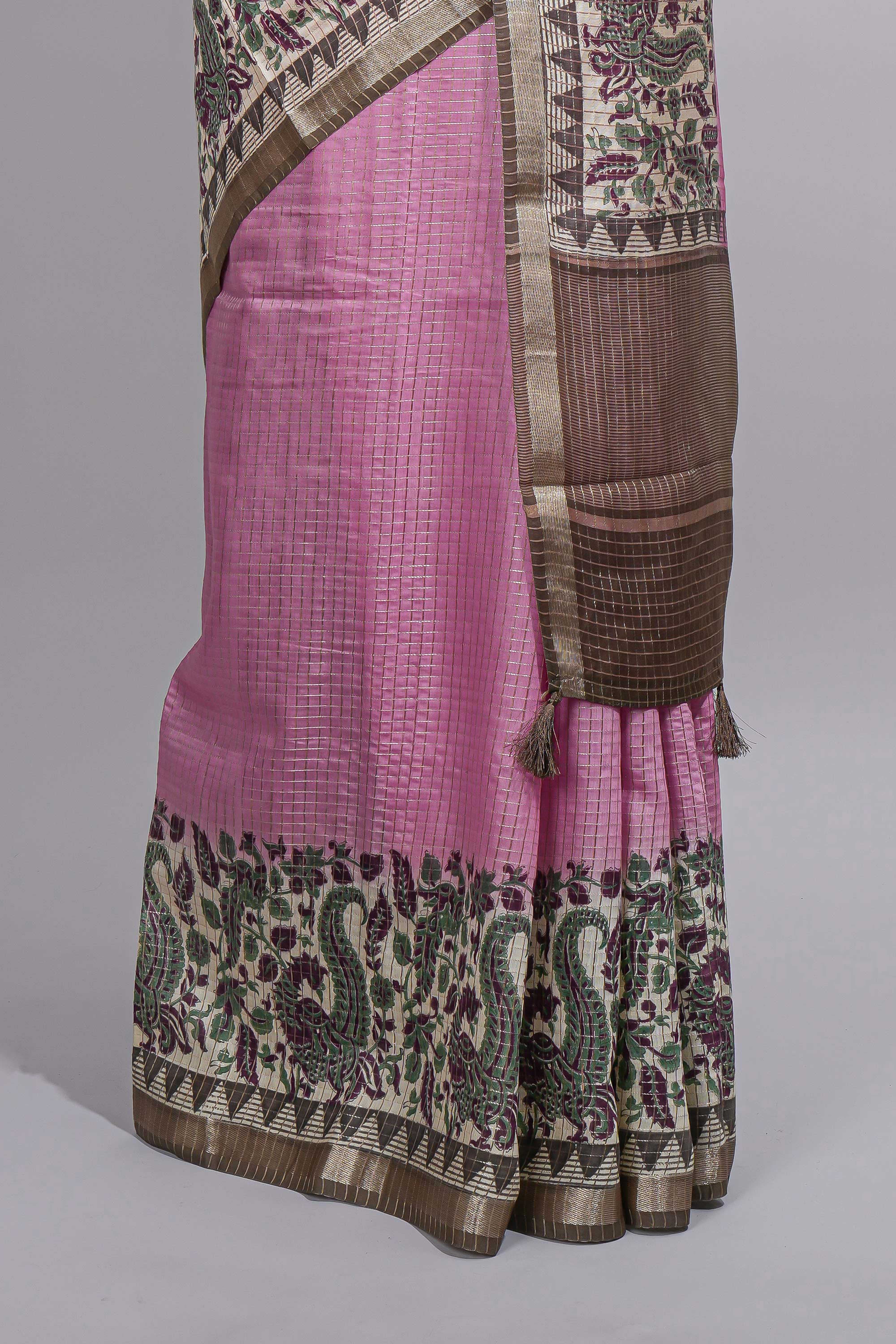 Elegant pastel pink Assam Silk saree withfloral woven motifs rich zari border and contrastpallu with fine stripes and tassel detailing along with blouse piece