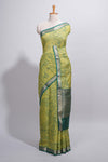 Parrot green Assam Silk saree abstract floral line motifs subtle woven details contrast pallu and rich zari border and contrast blouse