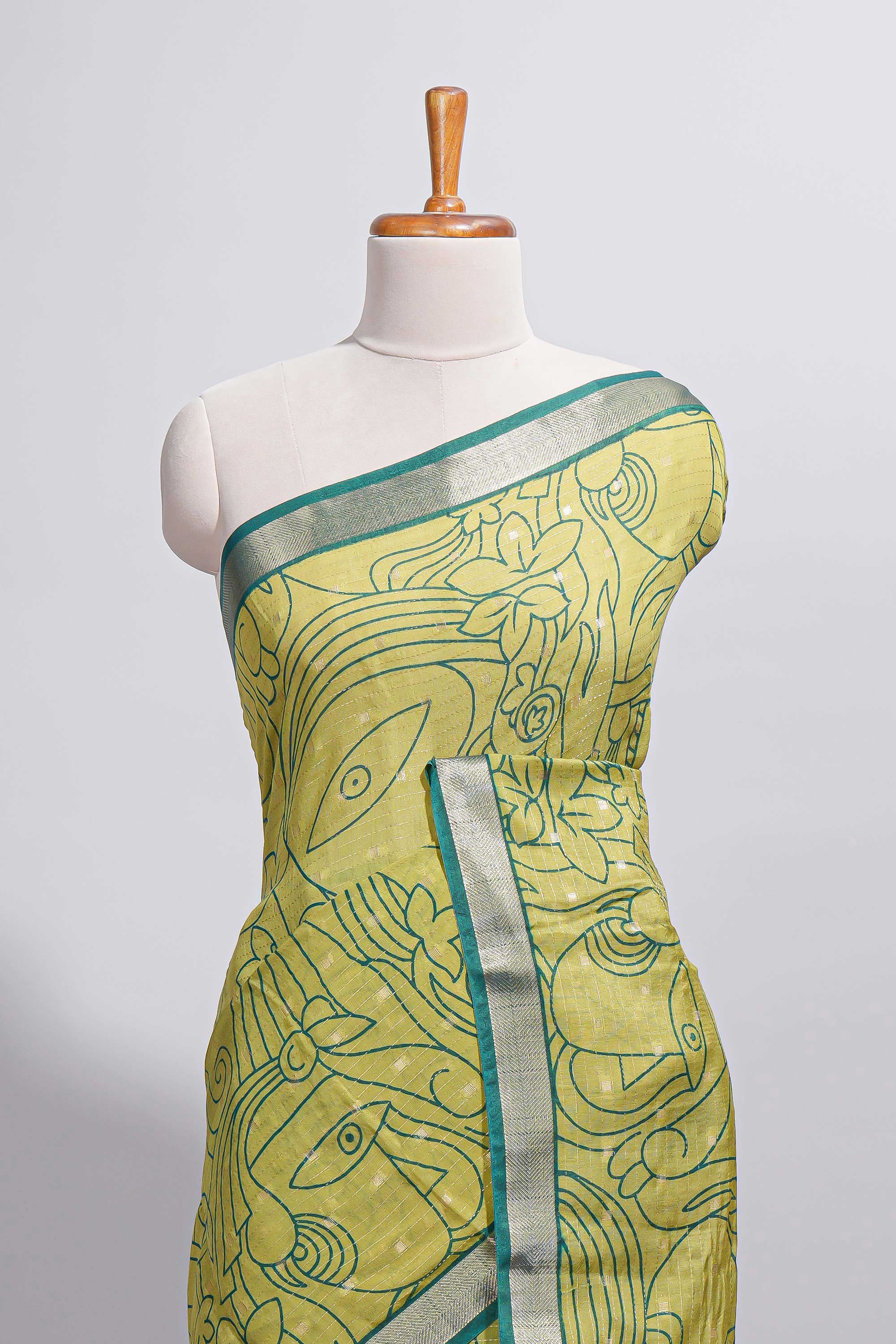 Parrot green Assam Silk saree abstract floral line motifs subtle woven details contrast pallu and rich zari border and contrast blouse