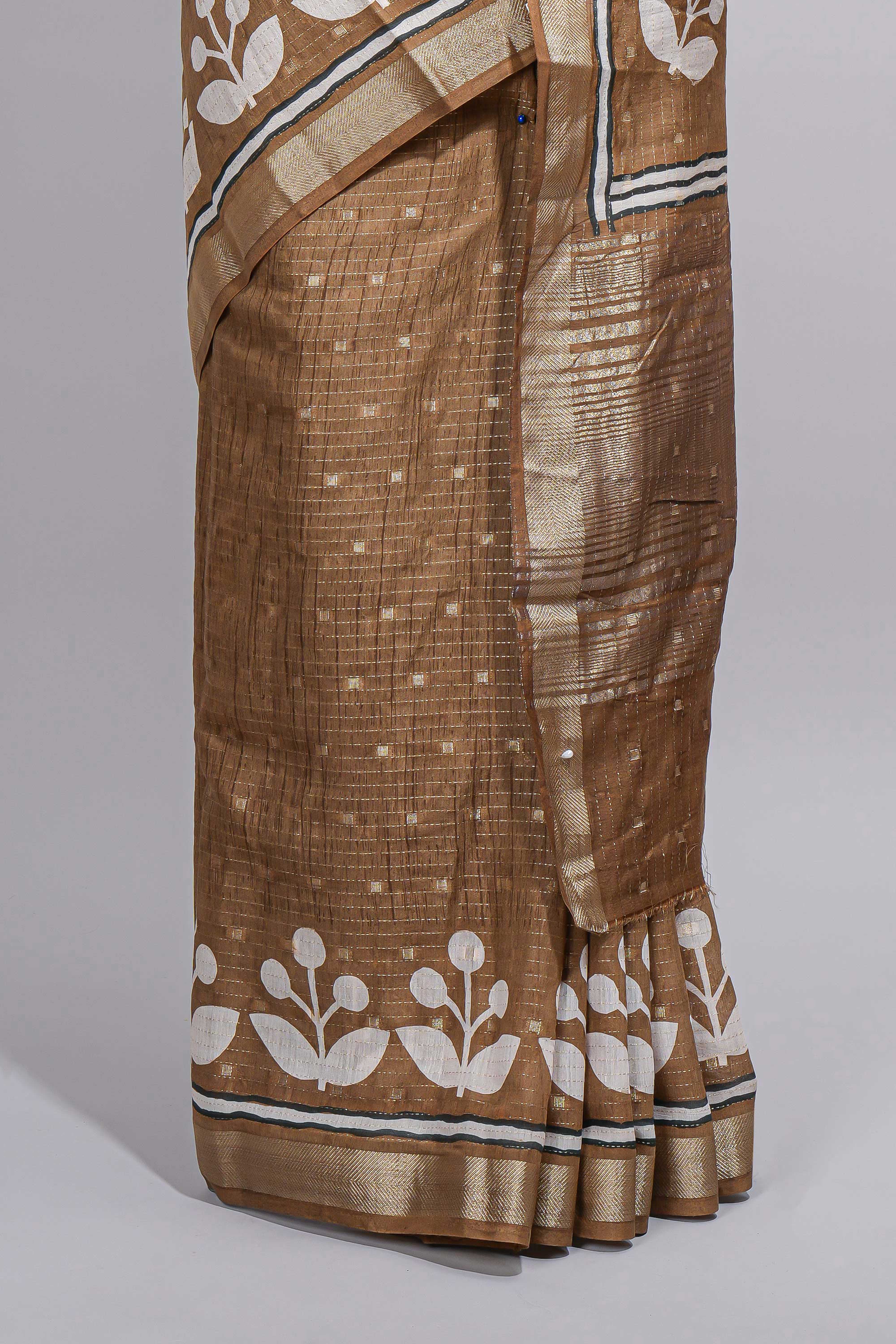 BrownAssam silk saree self-check body with small woven butta motifs and elegant white floral vine prints with zari border along with matching blouse