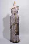 Elegant Grey Assam Silk saree with floral vine motifs detailed woven patterns contrastpallu and zari border alond with contrast blouse
