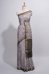 Grey green Assam Silk saree abstract floral line motifs subtle woven details contrast pallu and rich zari border and contrast blouse
