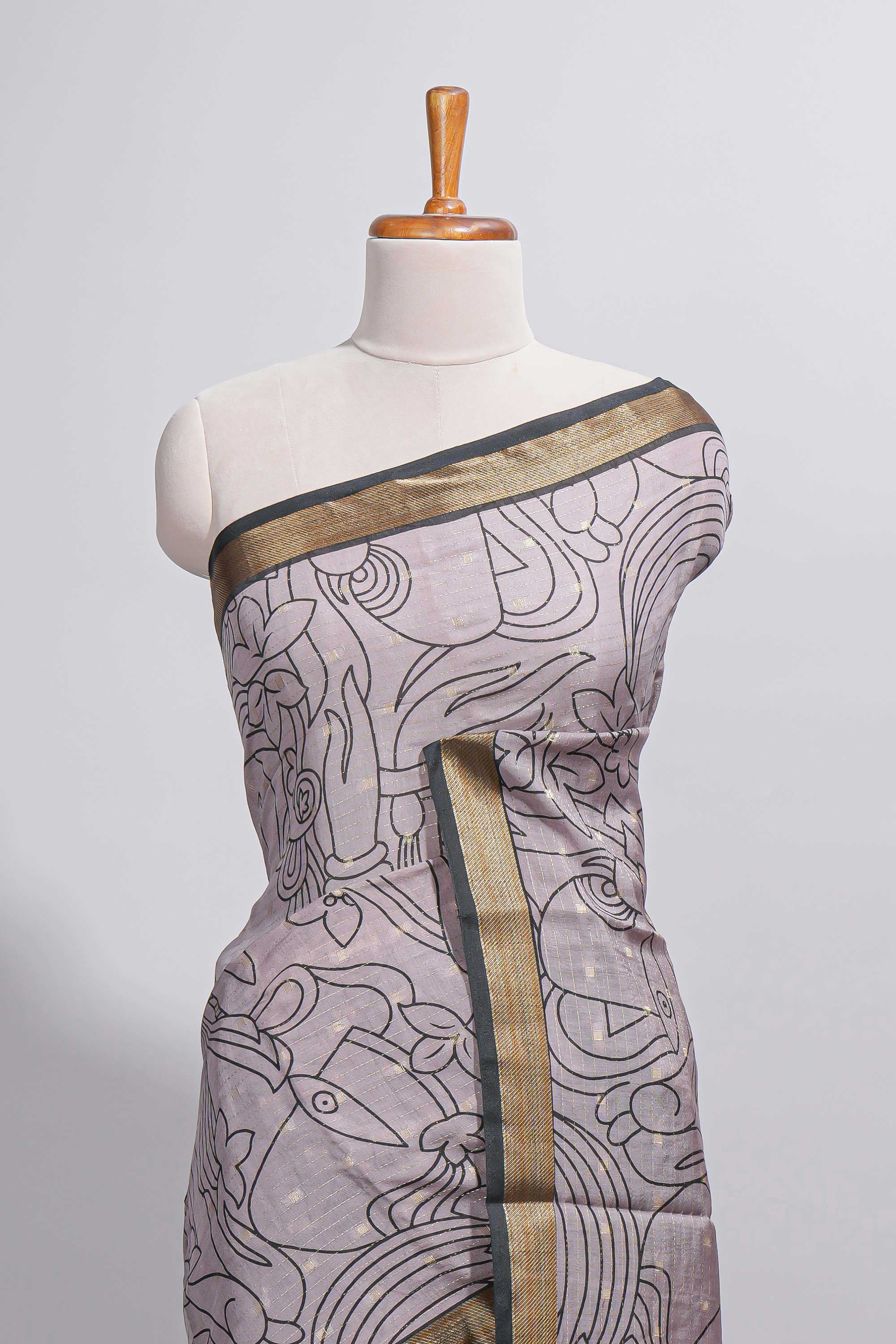 Grey green Assam Silk saree abstract floral line motifs subtle woven details contrast pallu and rich zari border and contrast blouse