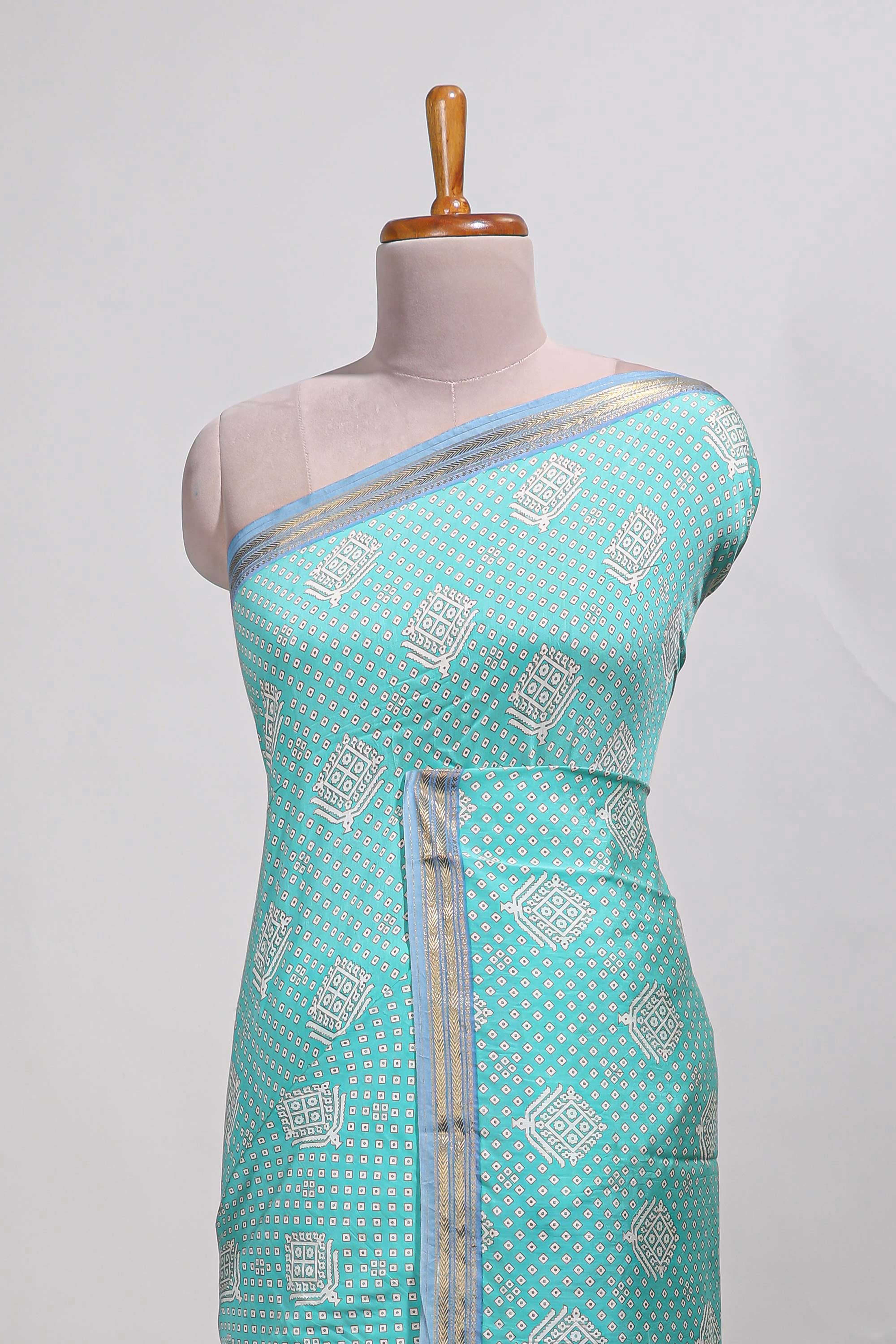 Light blue bandhaniassam silk saree withzari border and matching blouse