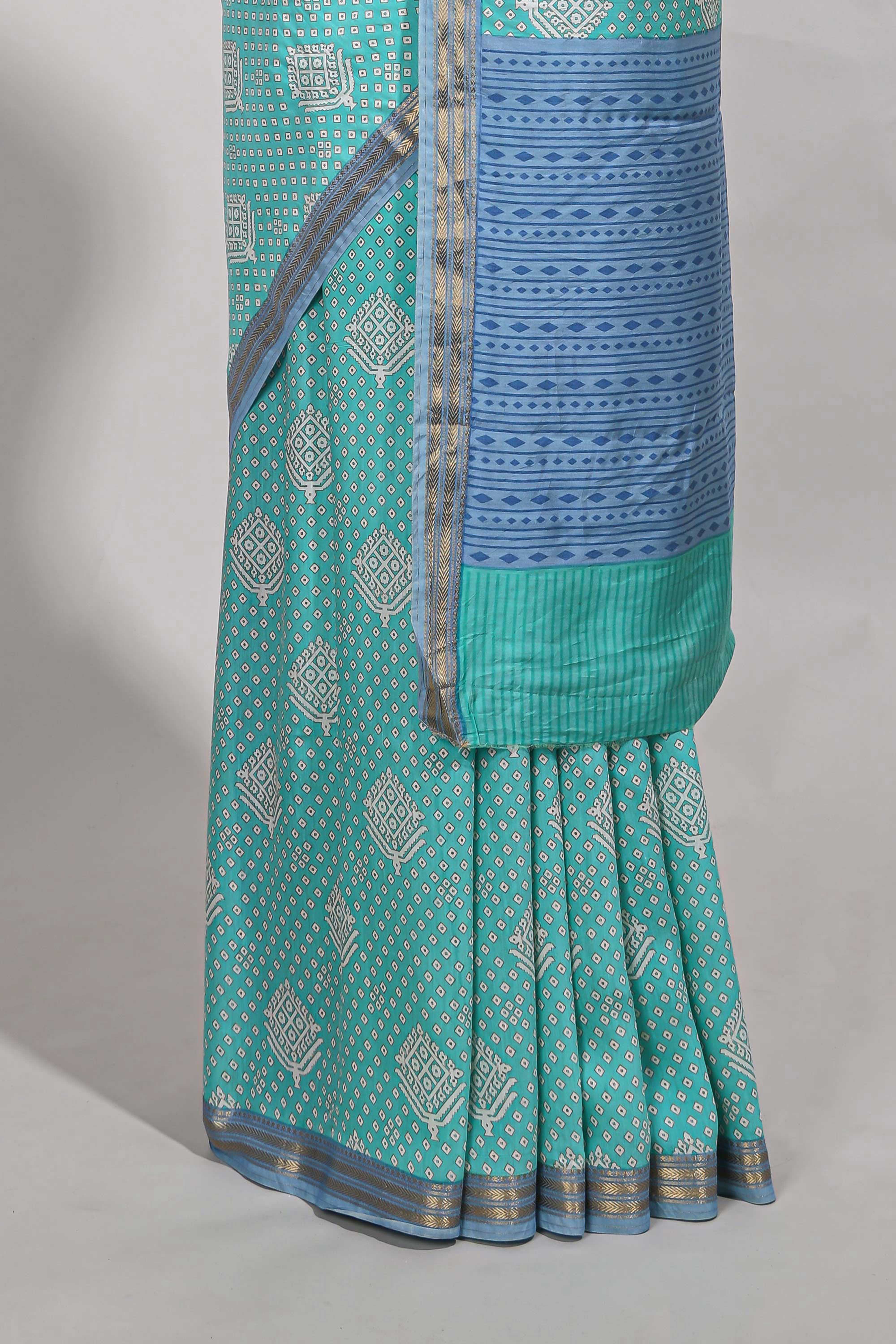 Light blue bandhaniassam silk saree withzari border and matching blouse