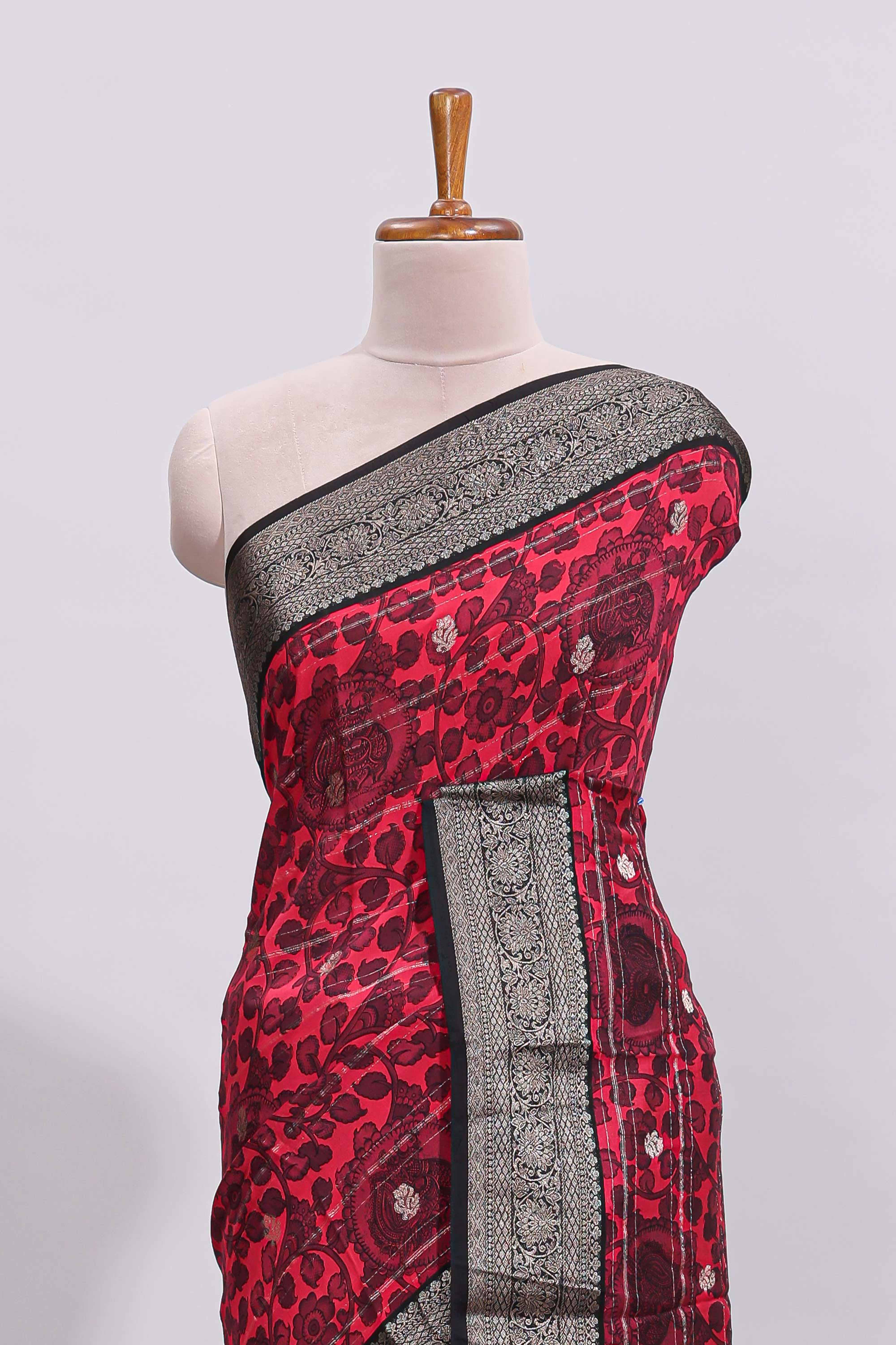 Pink floral design zari motifs assam silk saree with contrast zari border matching striped blouse