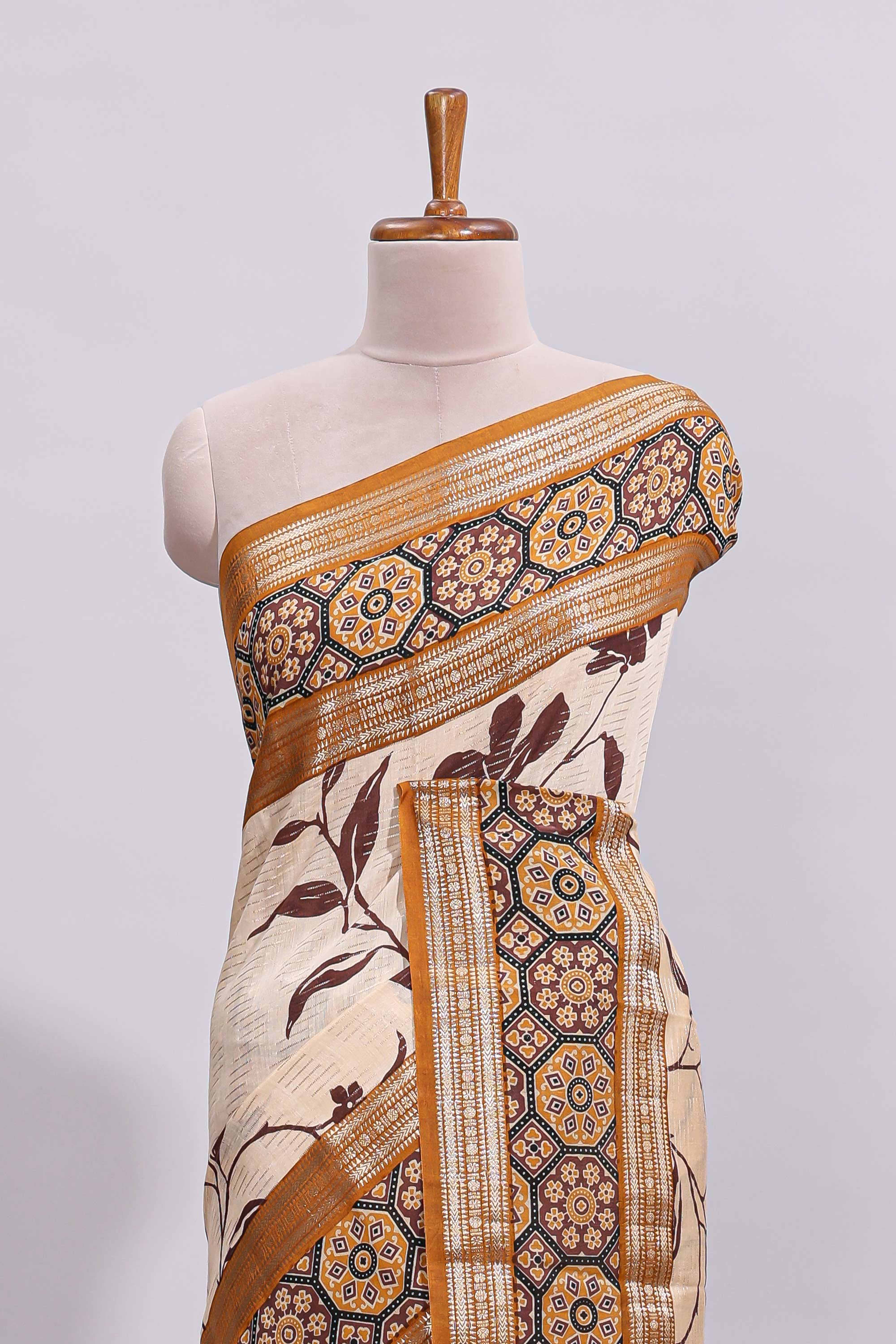 Cream floral design zari striped assam silk saree with contrast zari border and printed blouse