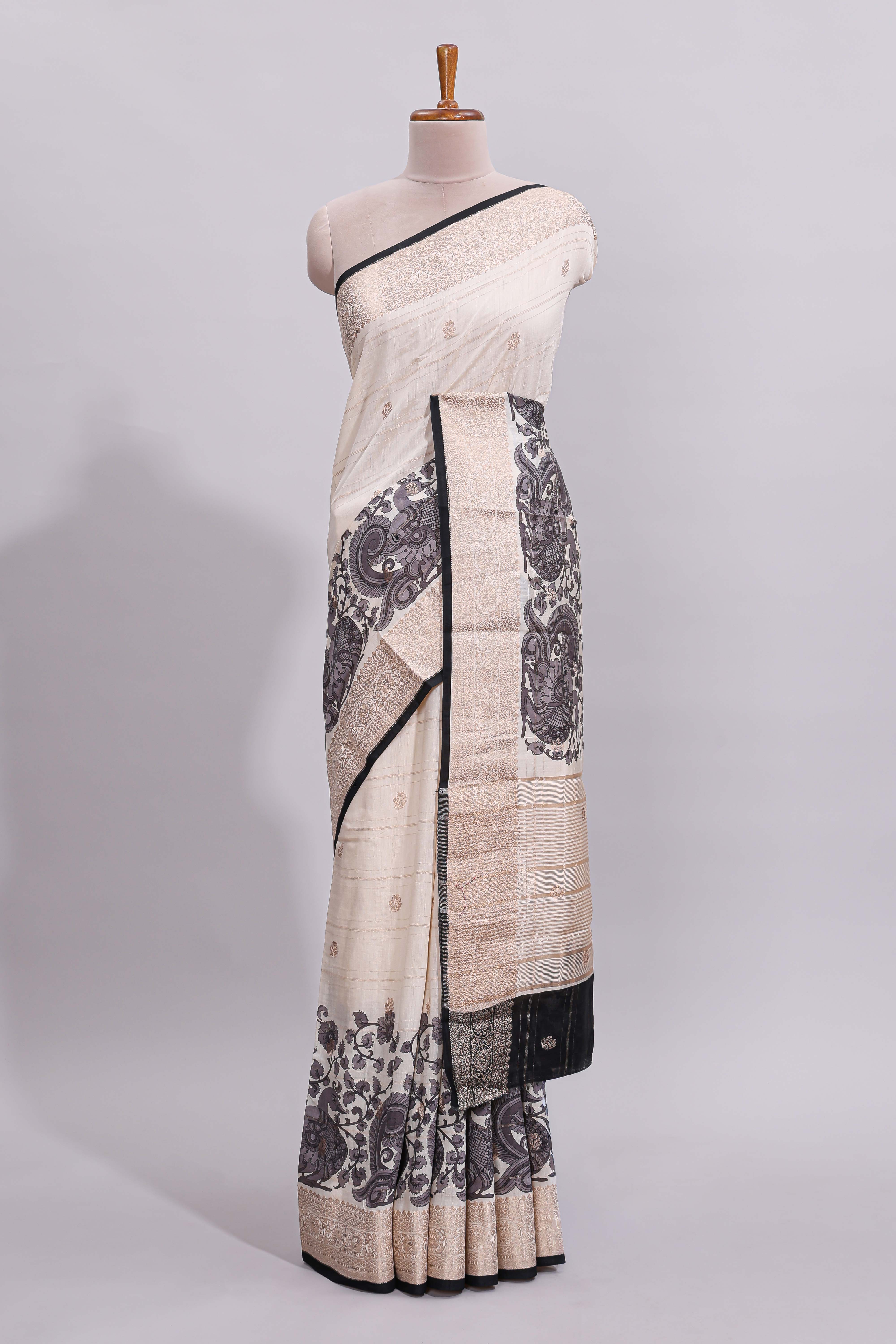 Off white striped zari motifs design assam silk saree with self zari border and contrast motifs blouse