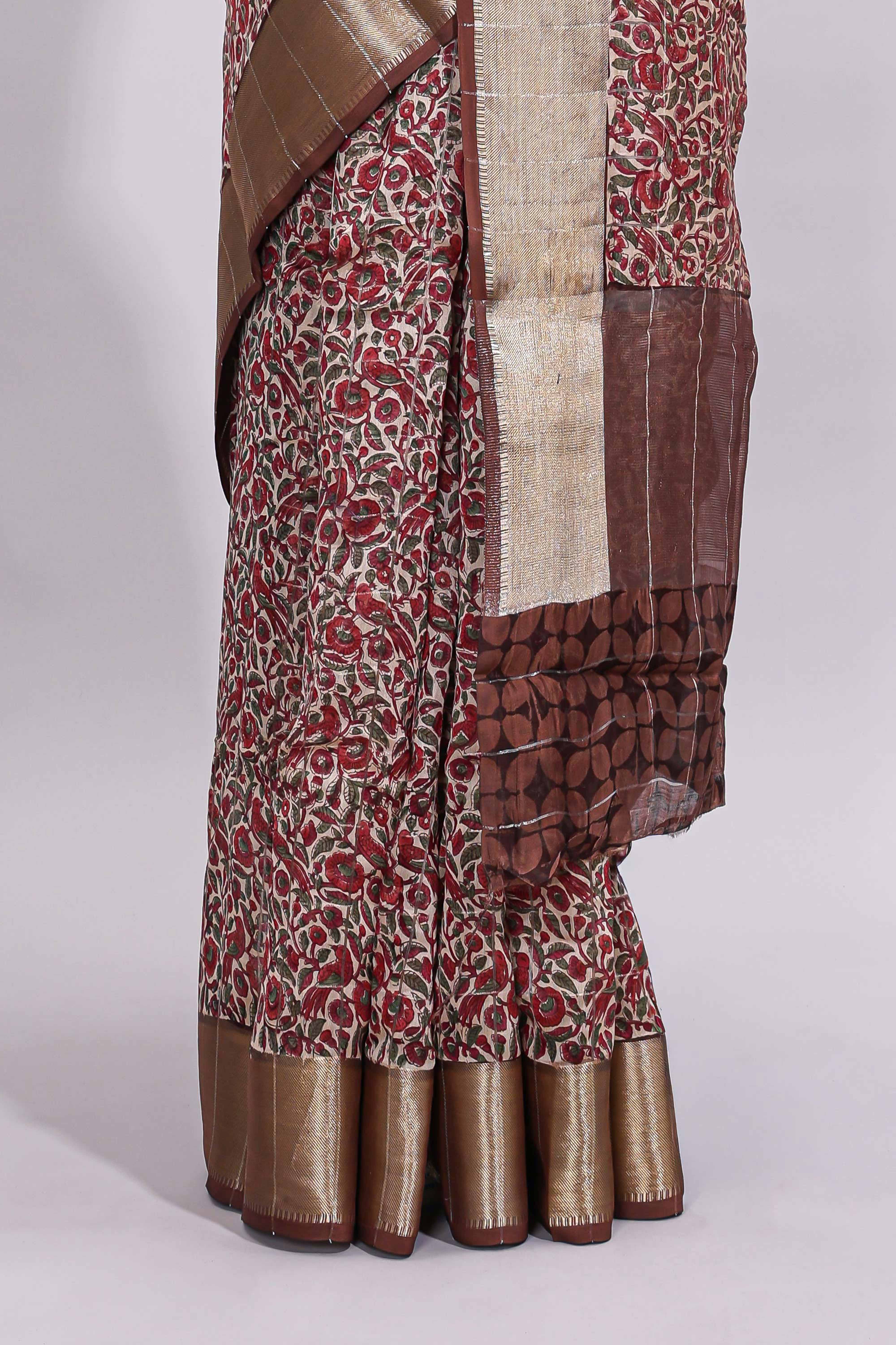 Beige checked floral design assam silk saree with contrast zari border and printed blouse