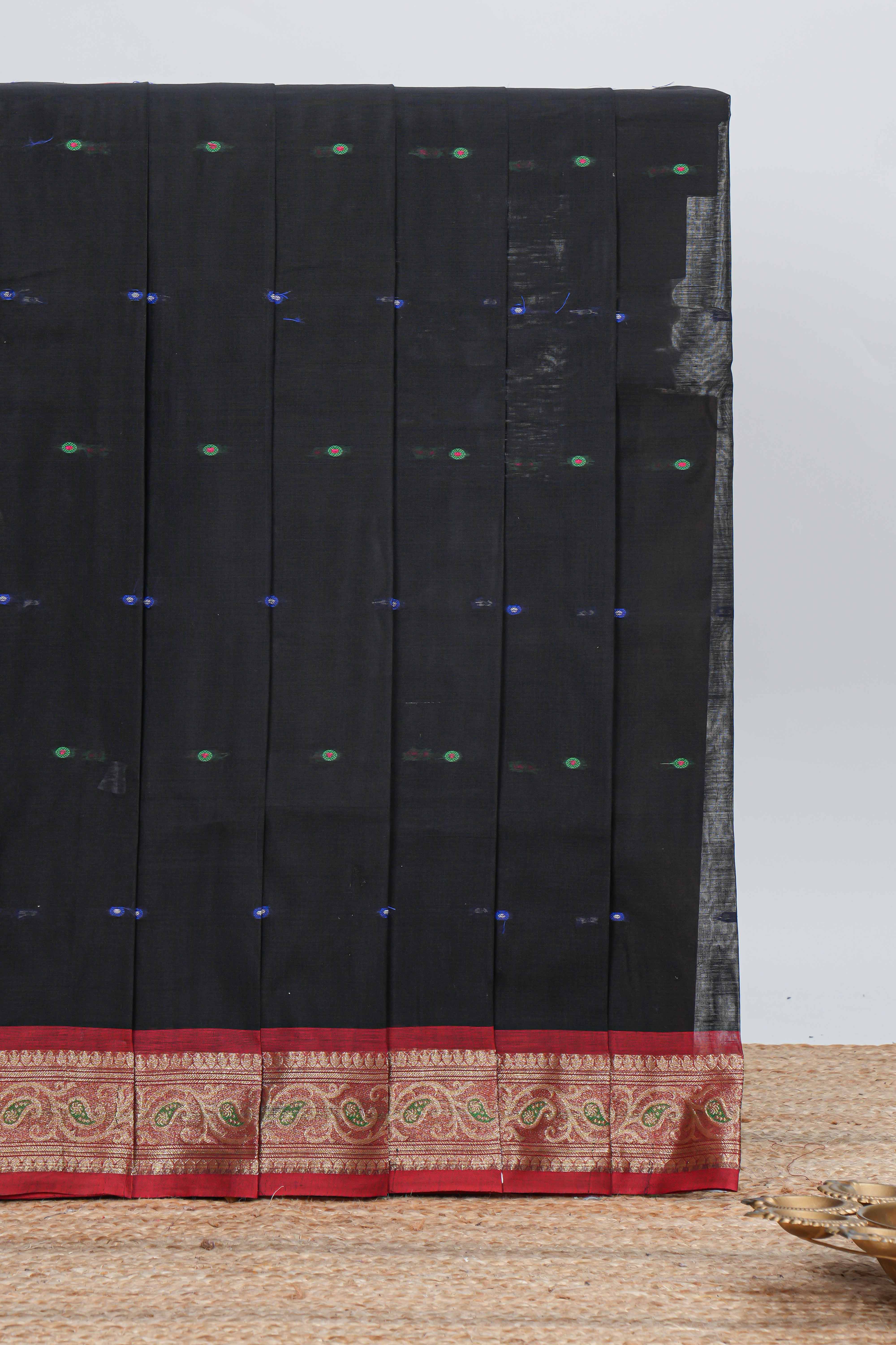 Black colour bengal cotton saree with all over thread buttas contrast bentex border and contrast pallu along with blouse piece