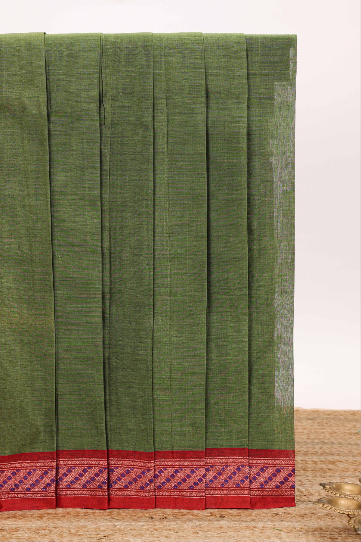Green plain design bengal cotton saree with contrast border and matching blouse