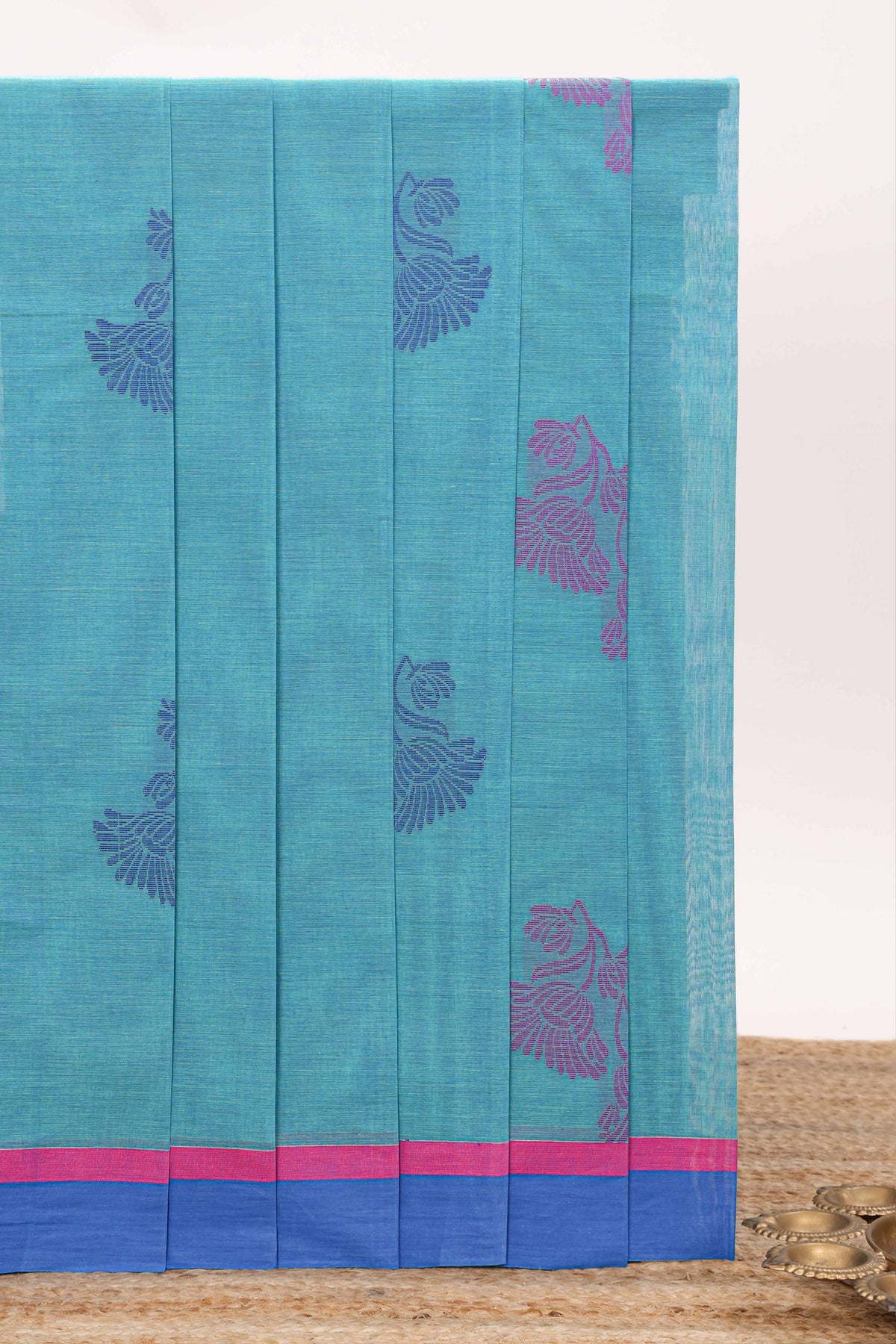 Blue floral motifs designed bengal cotton saree with contrast border and matching blouse