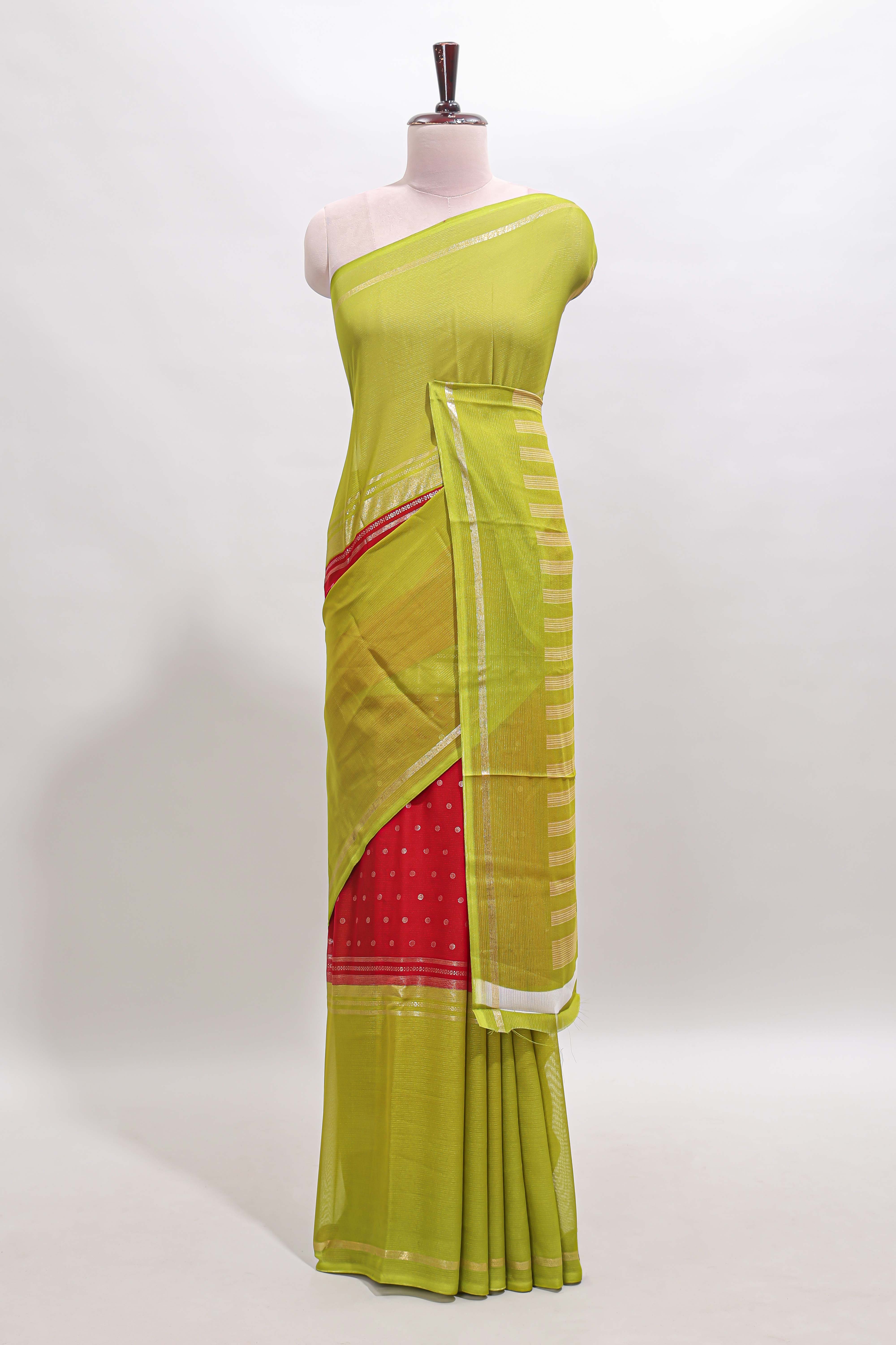 Red zari butta semi soft silk saree with contrast border and zari striped pallu