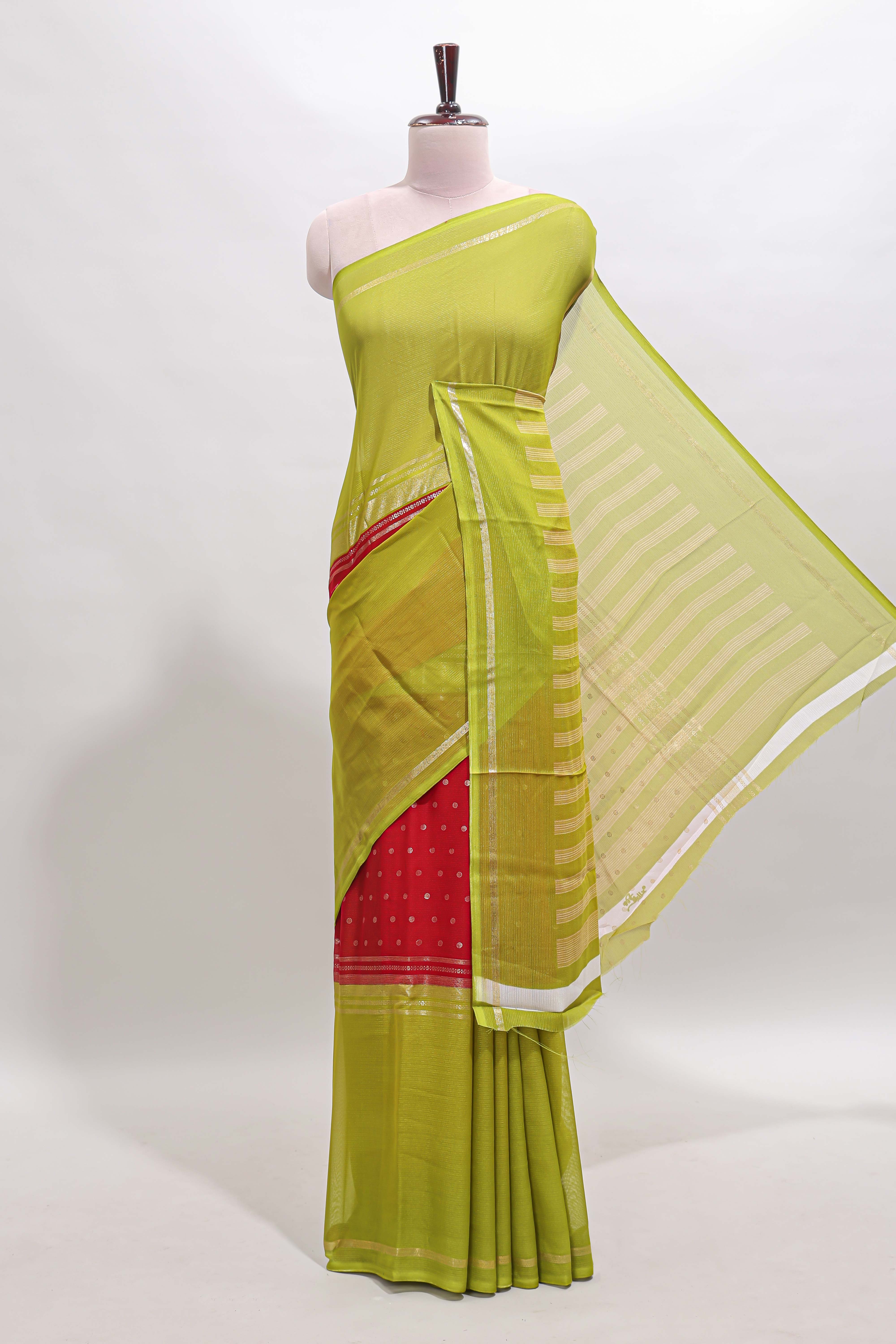 Red zari butta semi soft silk saree with contrast border and zari striped pallu