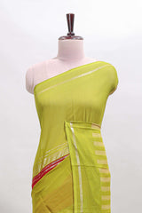 Red zari butta semi soft silk saree with contrast border and zari striped pallu