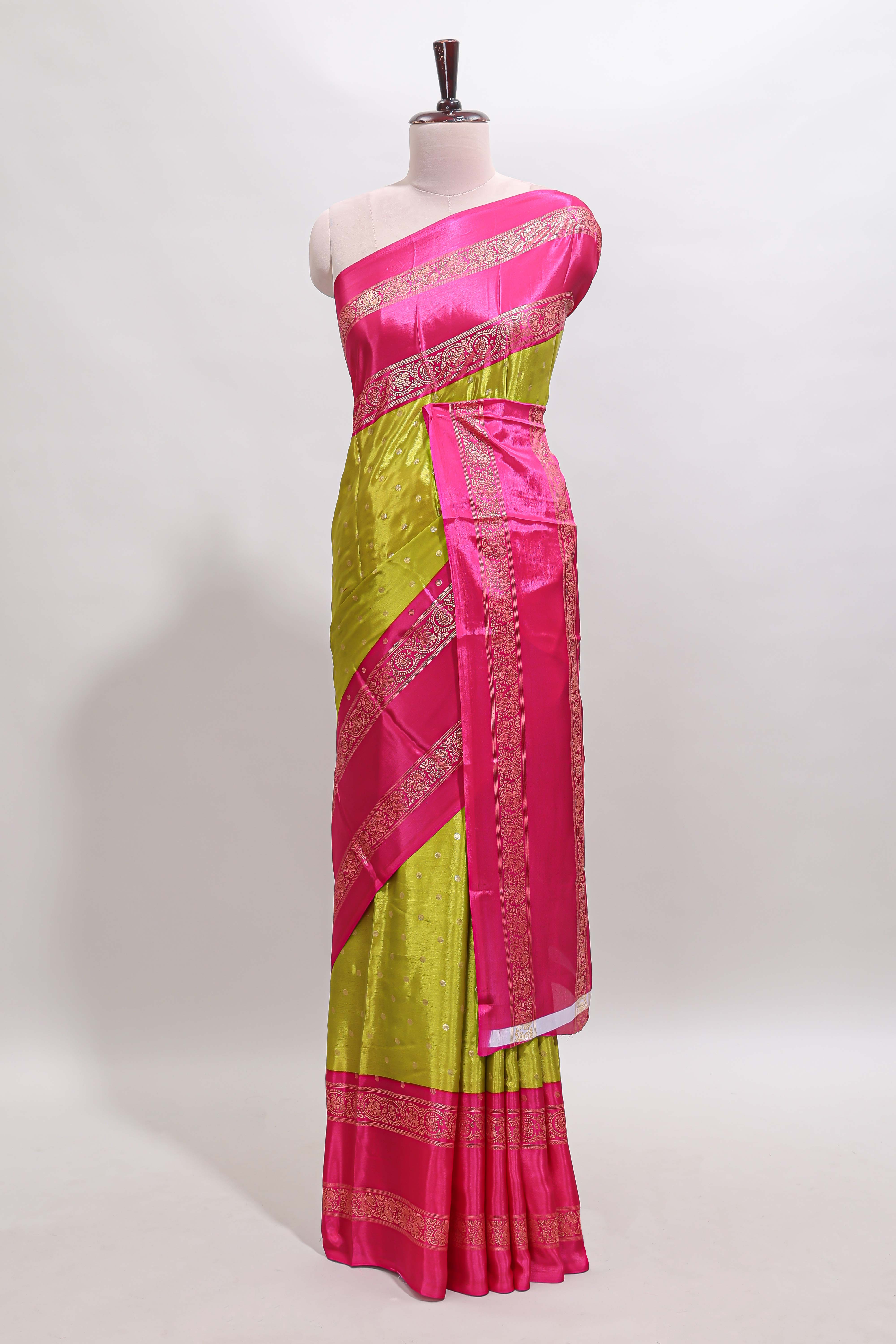 Lime green zari butta semi soft silk saree with contrast bentex border and zari striped pallu
