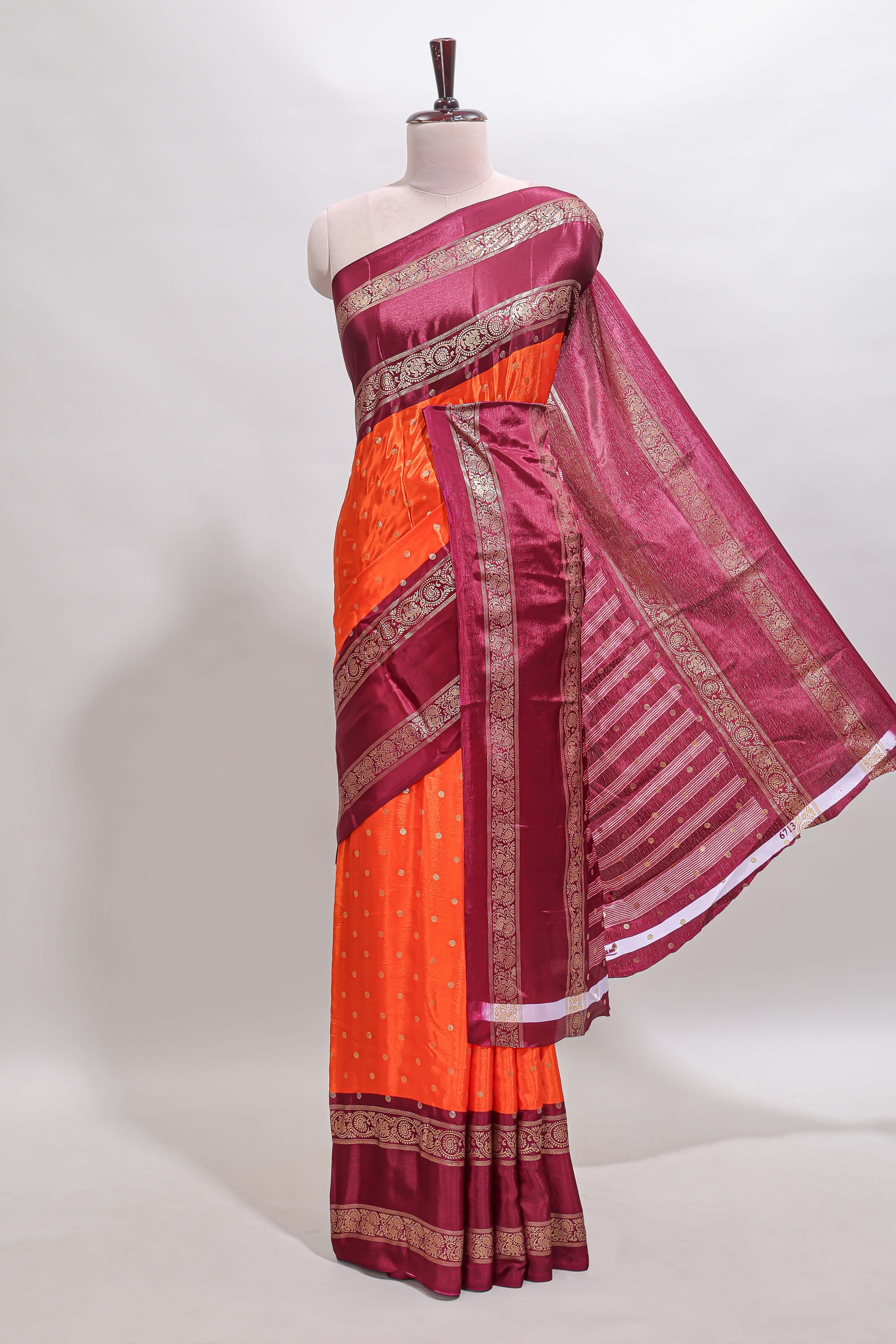 Orange zari butta semi soft silk saree with contrast bentex border and zari striped pallu