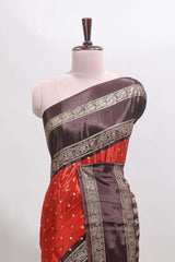 Deep orange zari butta semi soft silk saree with contrast bentex border and zari striped pallu
