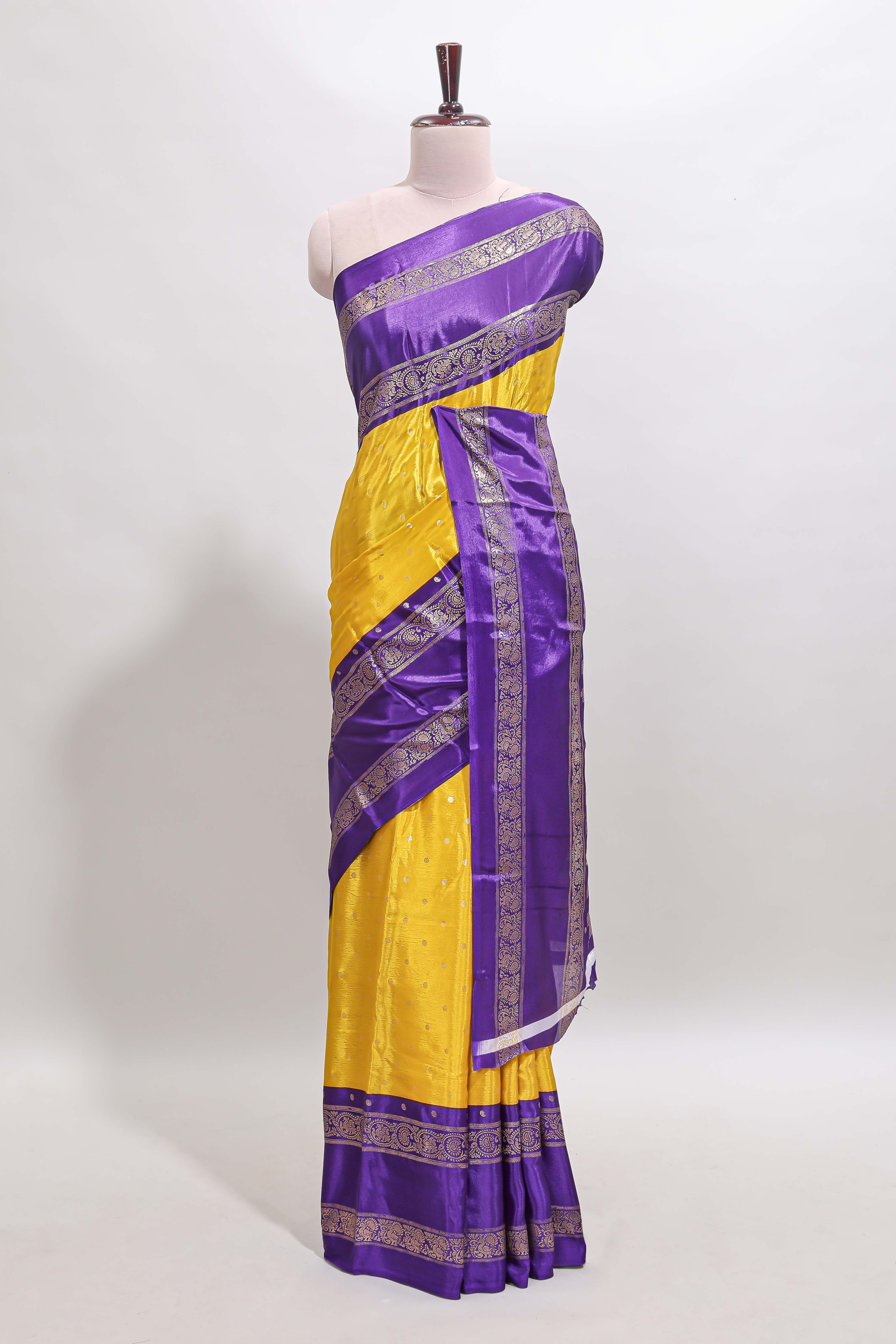 Yellow zari butta semi soft silk saree with contrast bentex border and zari striped pallu