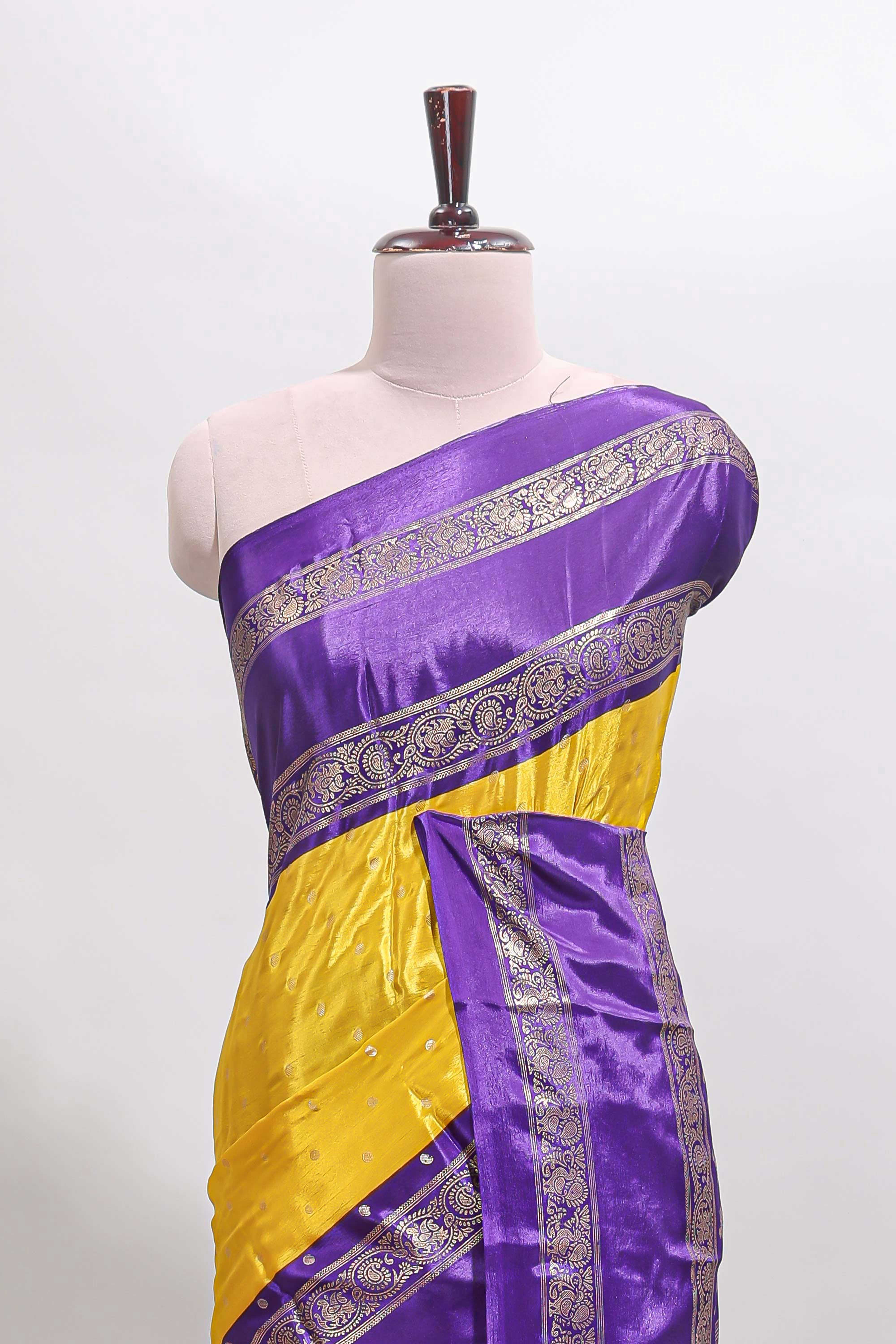 Yellow zari butta semi soft silk saree with contrast bentex border and zari striped pallu