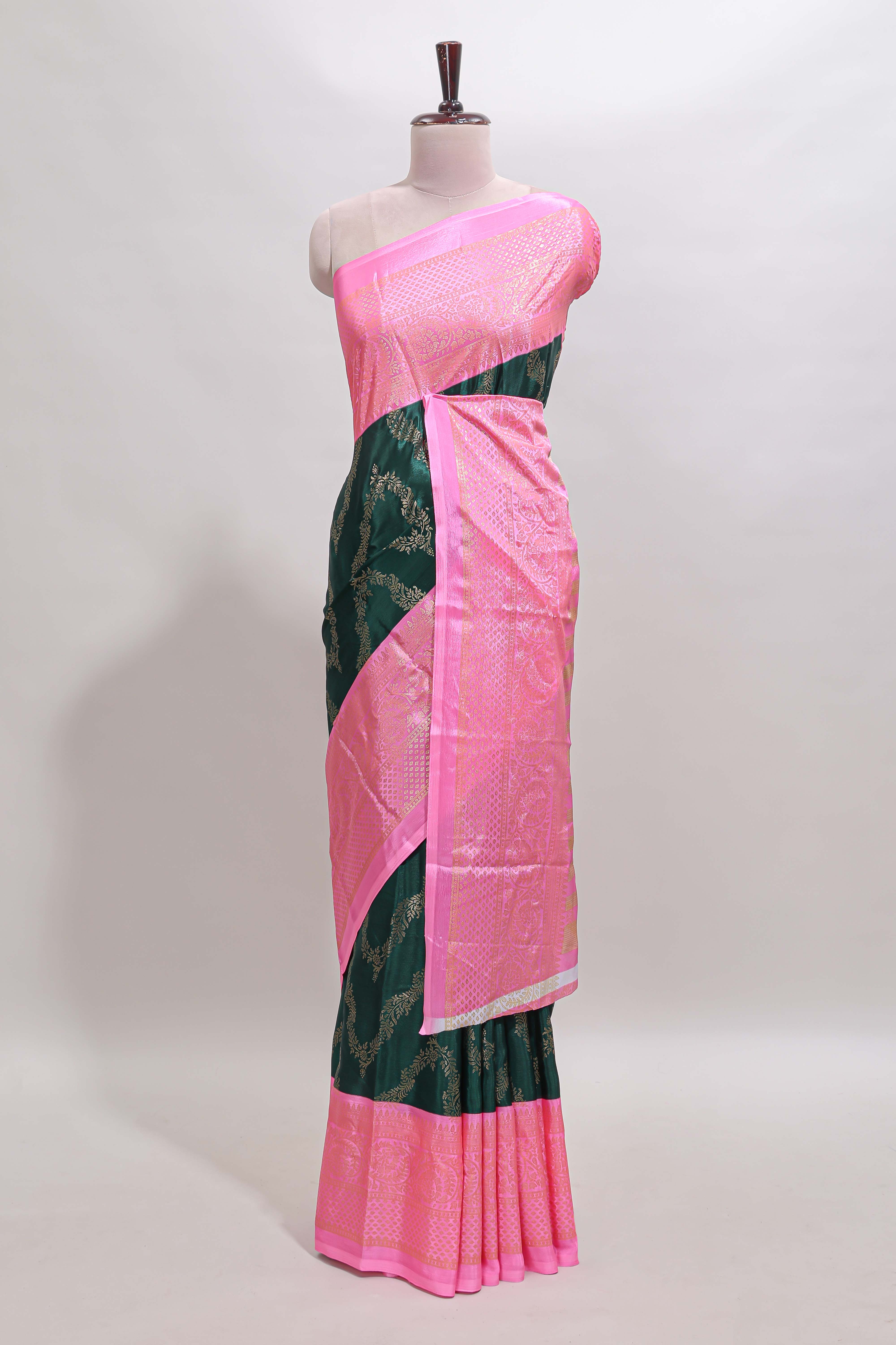 Green floral vine chevron design semi soft silk saree with contrast zari border and striped pallu