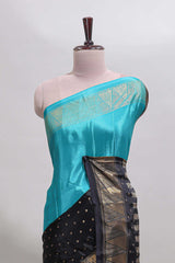 Blue & black dual shade zari motifs semi soft silk saree with self border and striped pallu