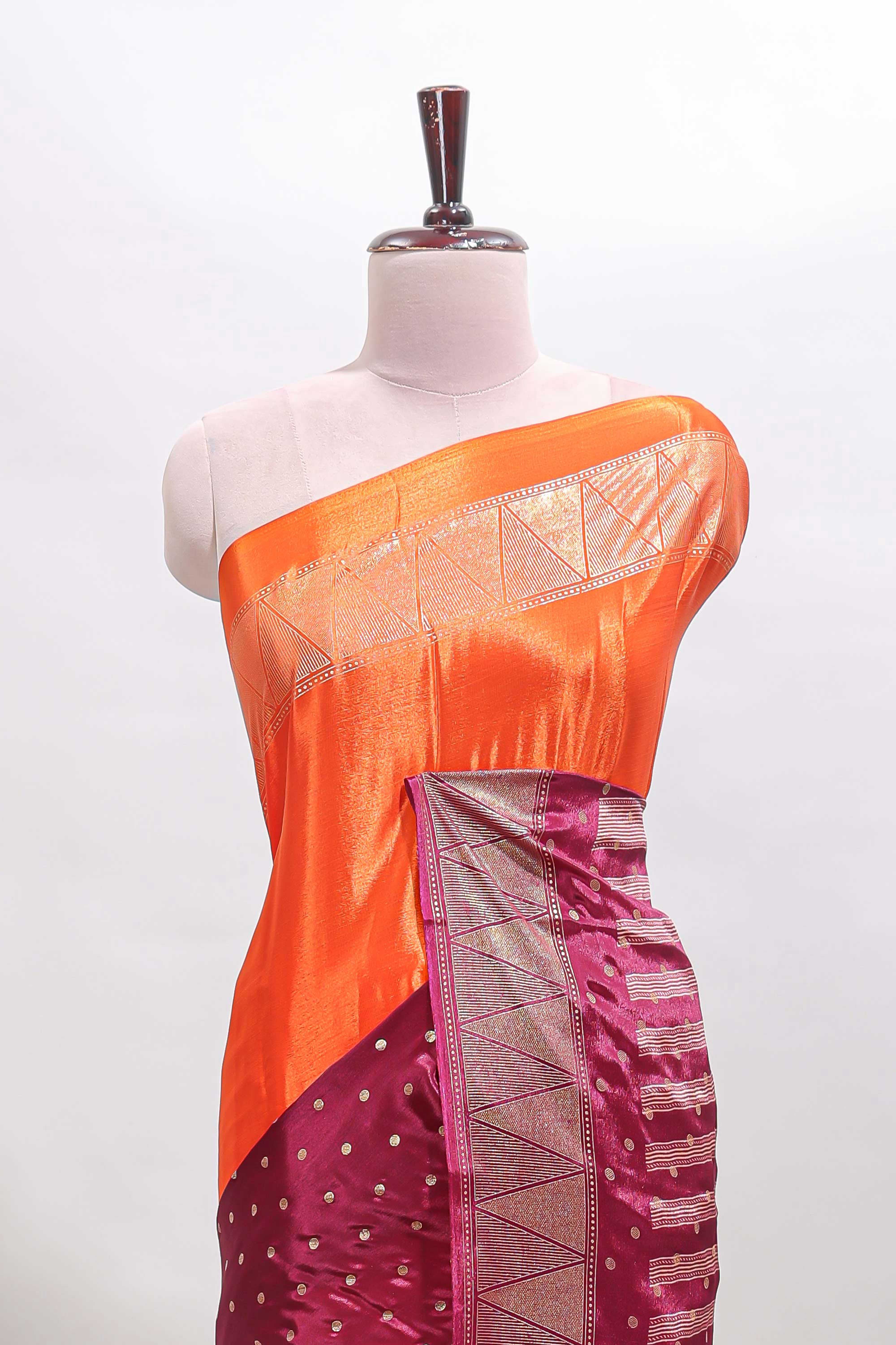 Orange & maroon dual shade zari motifs semi soft silk saree with self border and striped pallu