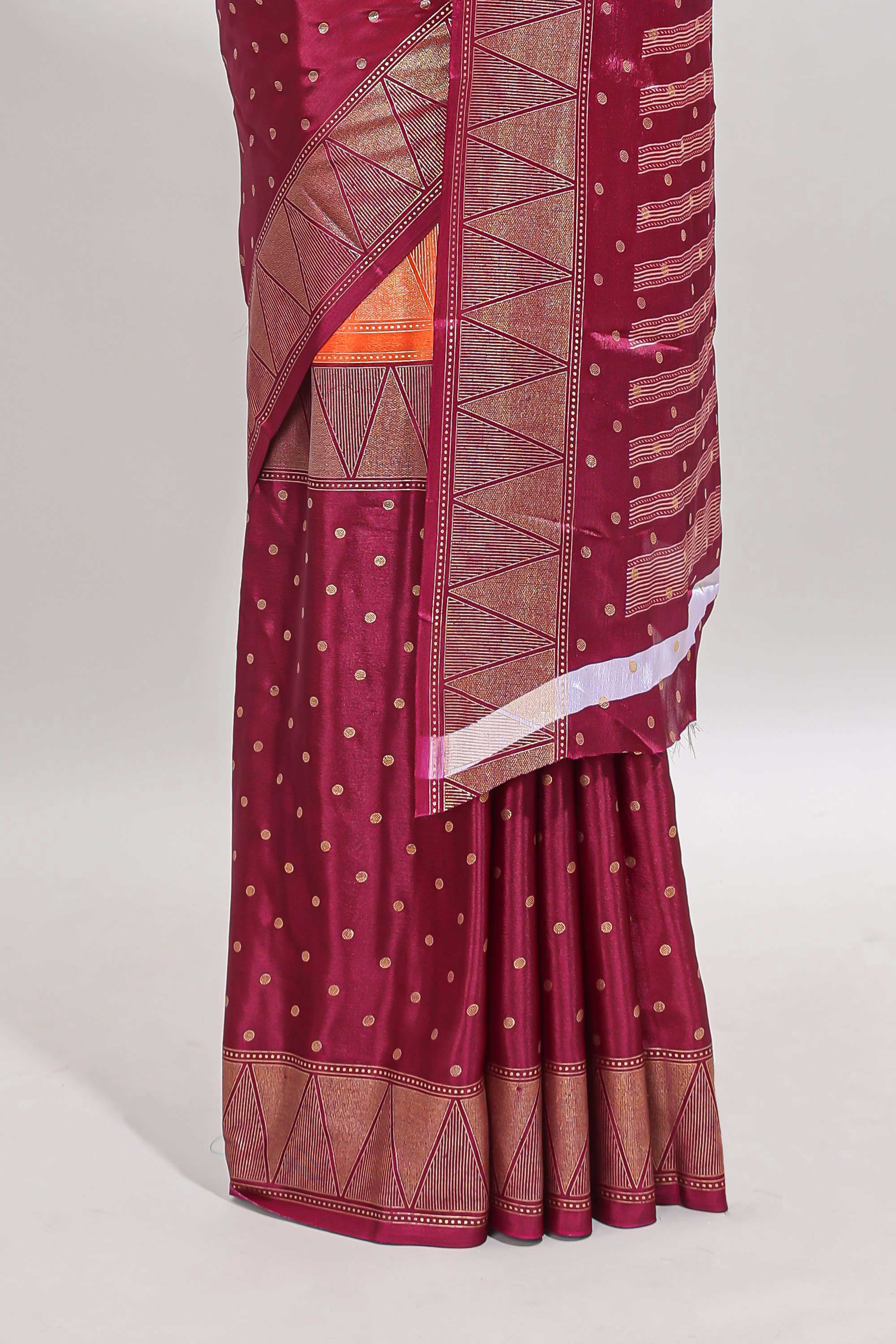 Orange & maroon dual shade zari motifs semi soft silk saree with self border and striped pallu