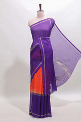 Orange zari motifs semi soft silk saree with contrast border and striped blouse