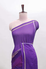 Orange zari motifs semi soft silk saree with contrast border and striped blouse