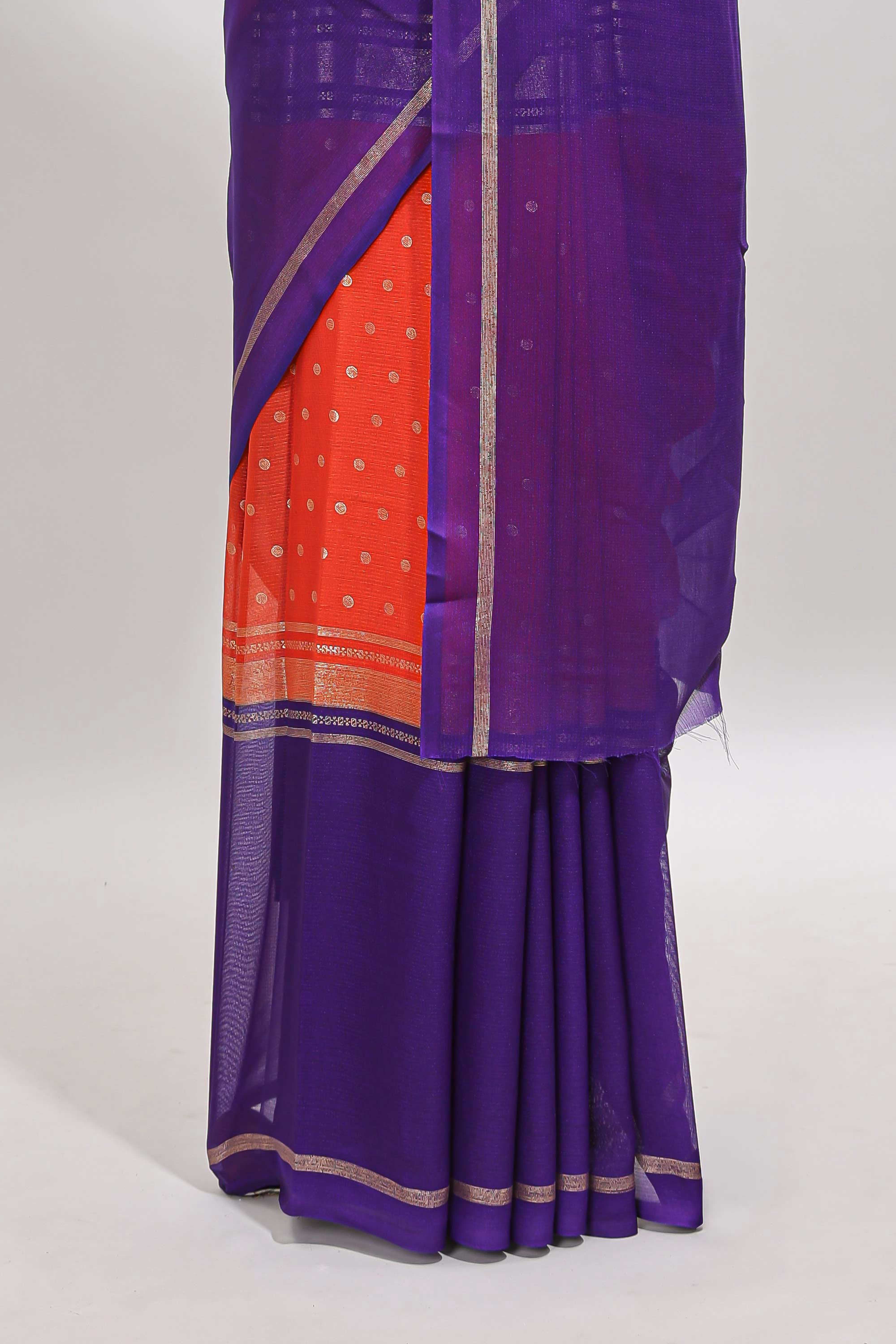Orange zari motifs semi soft silk saree with contrast border and striped blouse