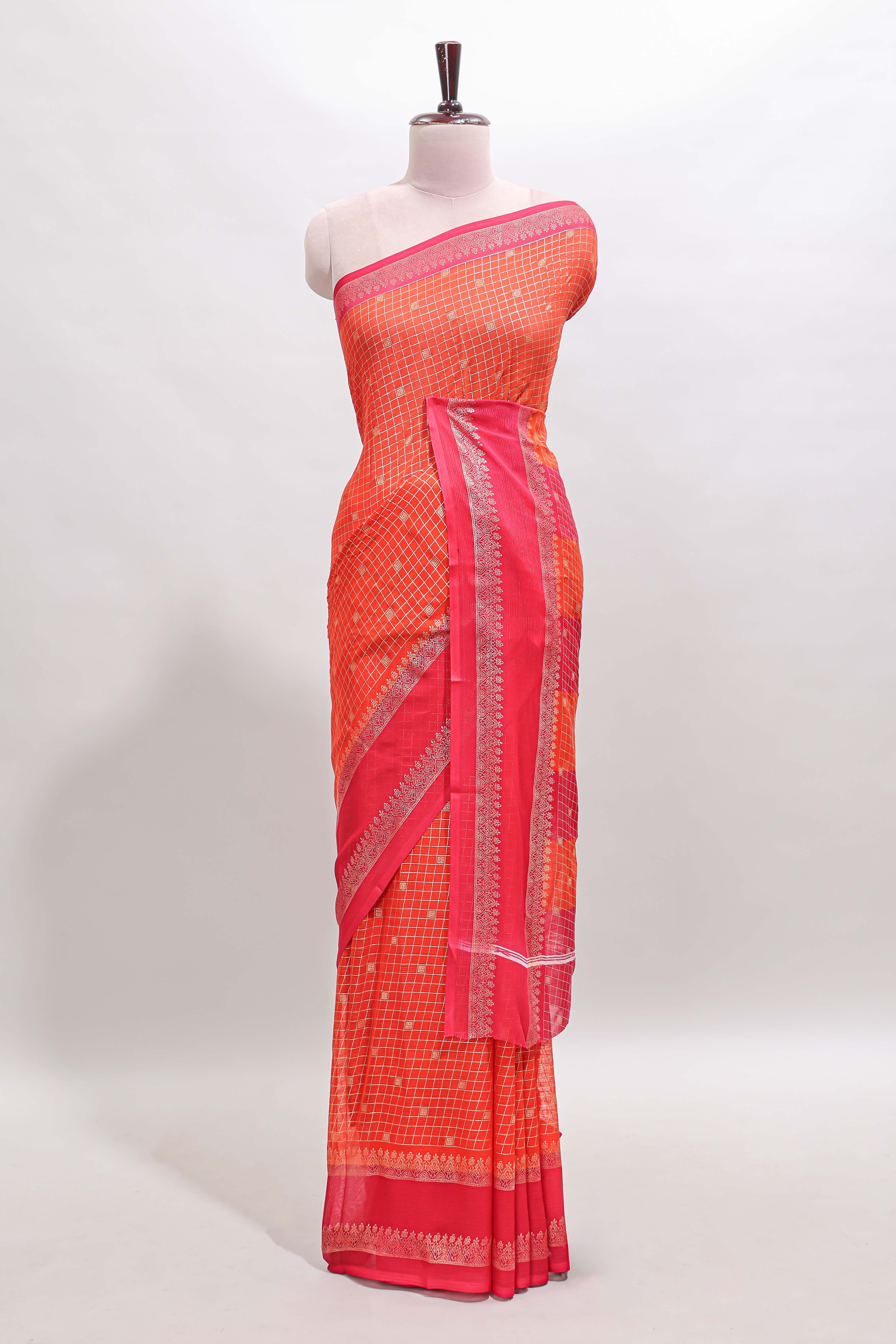 Orange checked semi soft silk saree with contrast border and striped pallu